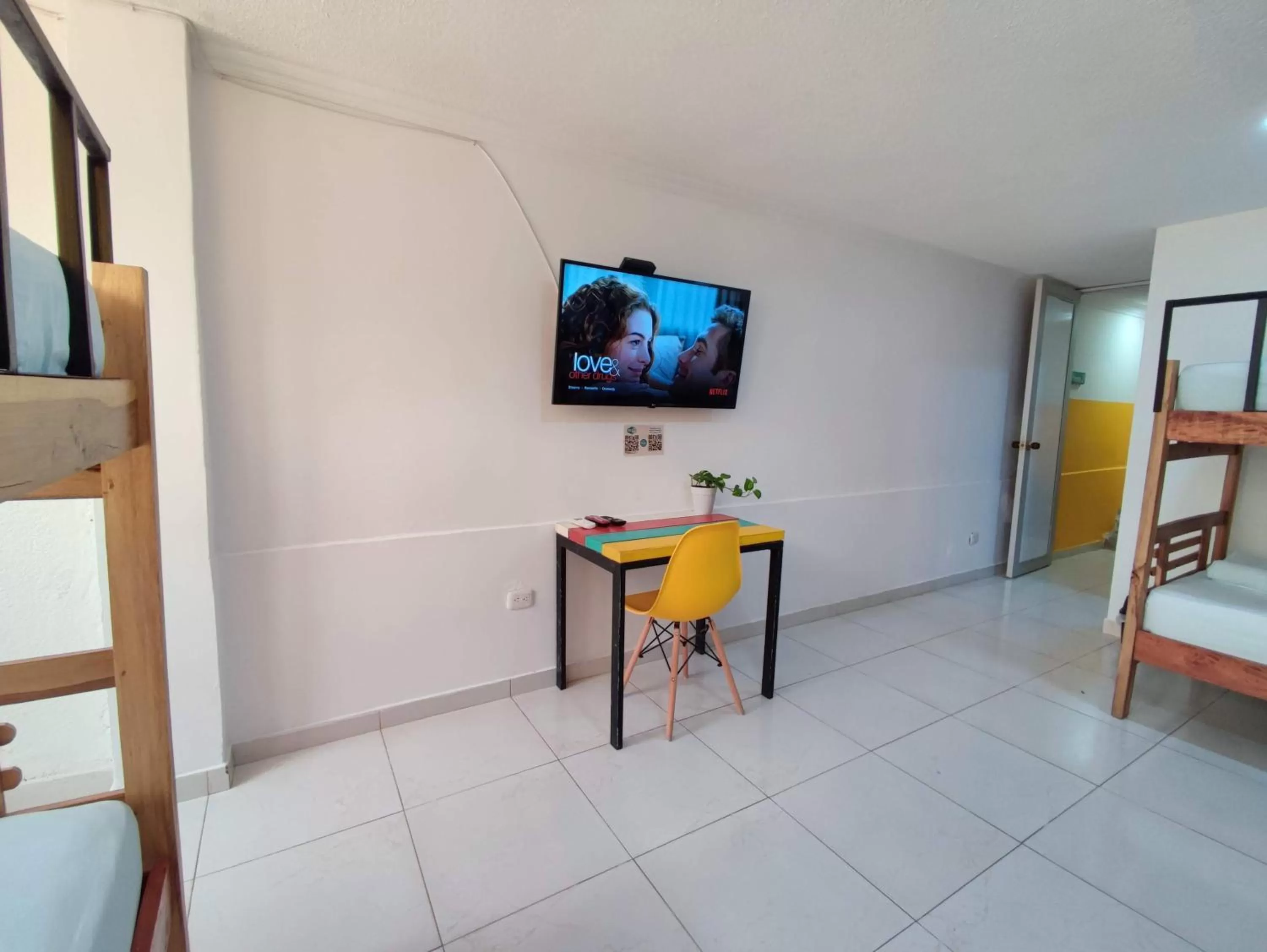 TV/Entertainment Center in Bona Vida Hotel