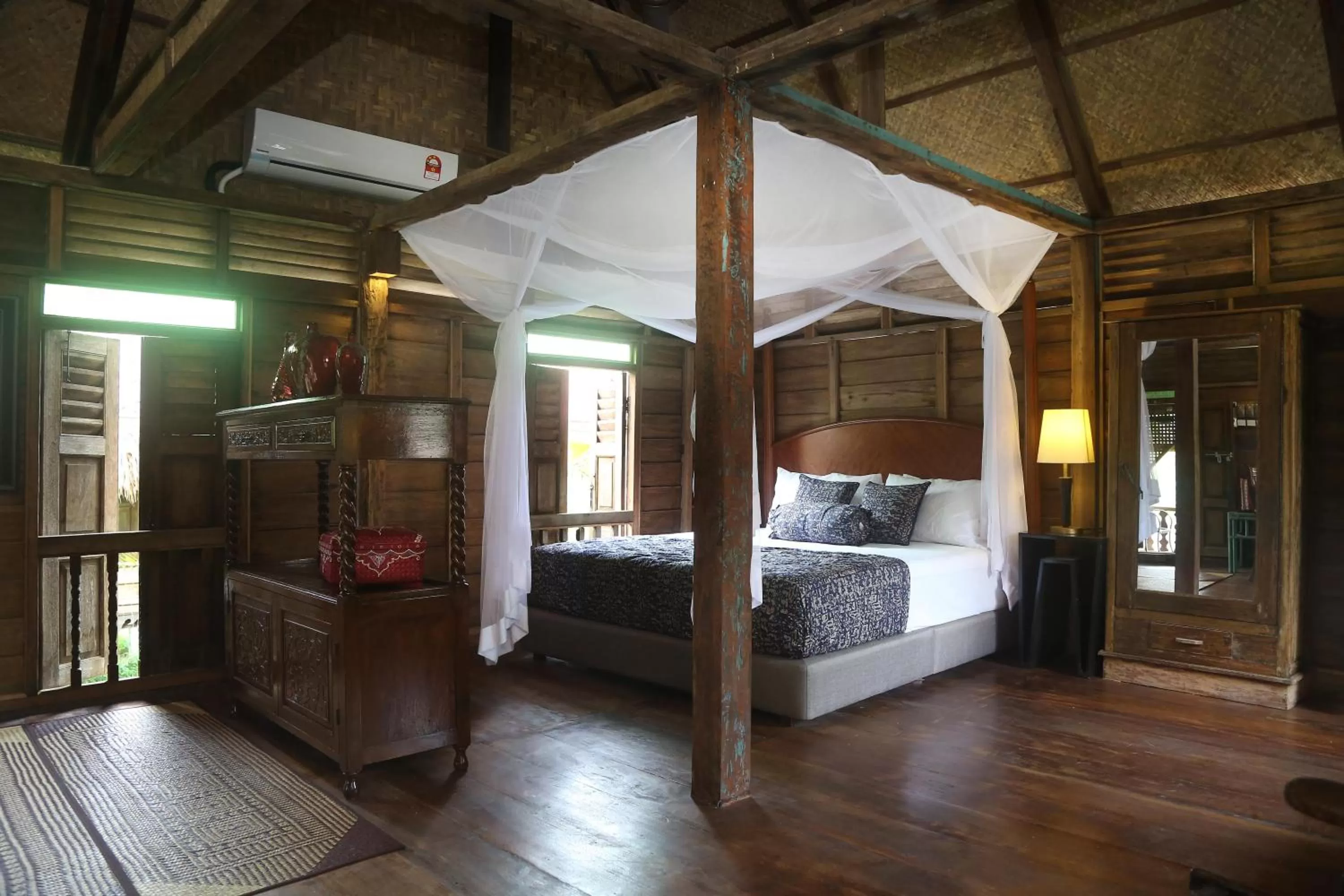 Bed in Kunang Kunang Heritage Villas