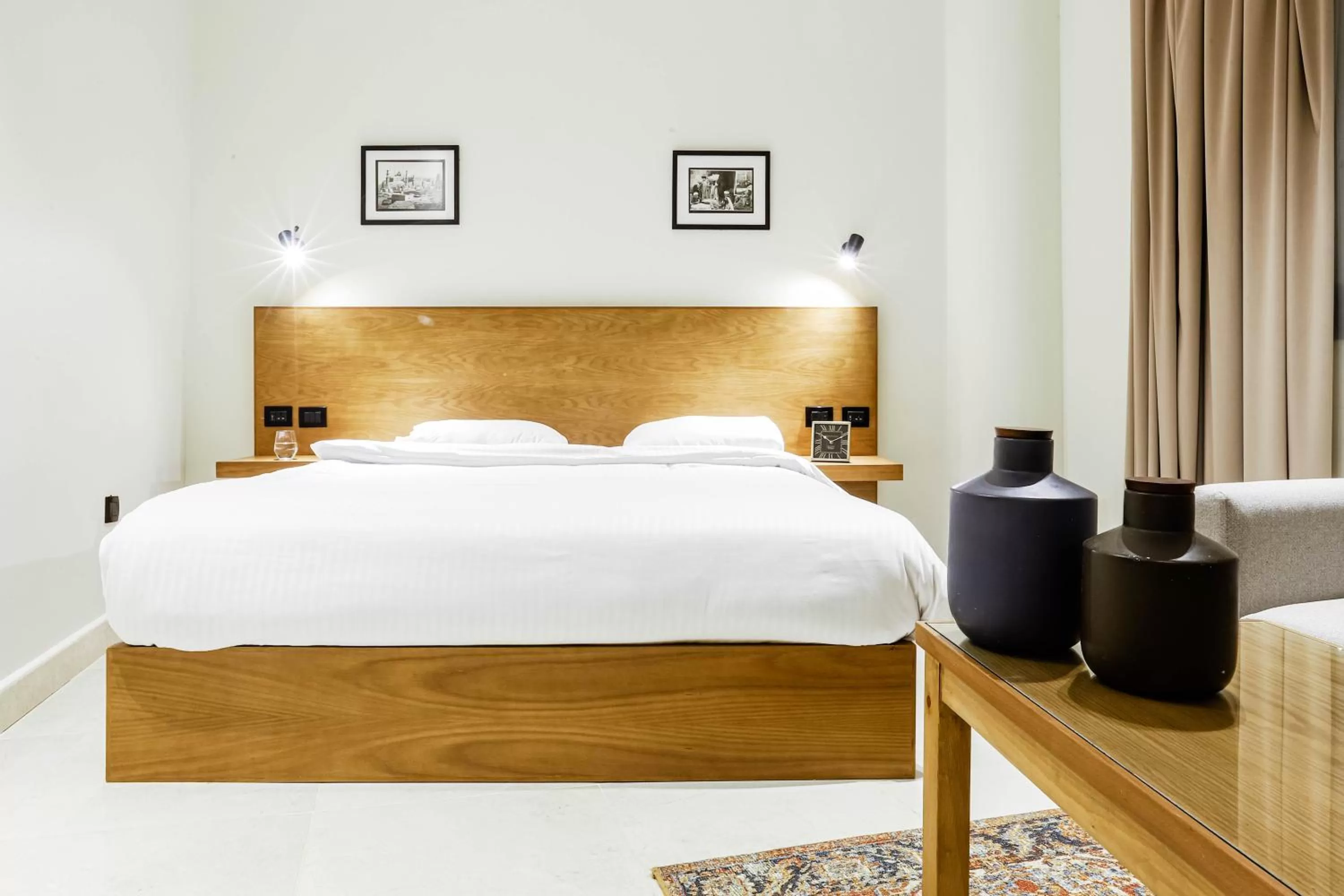 Bed in NewCity Hotel & Suites