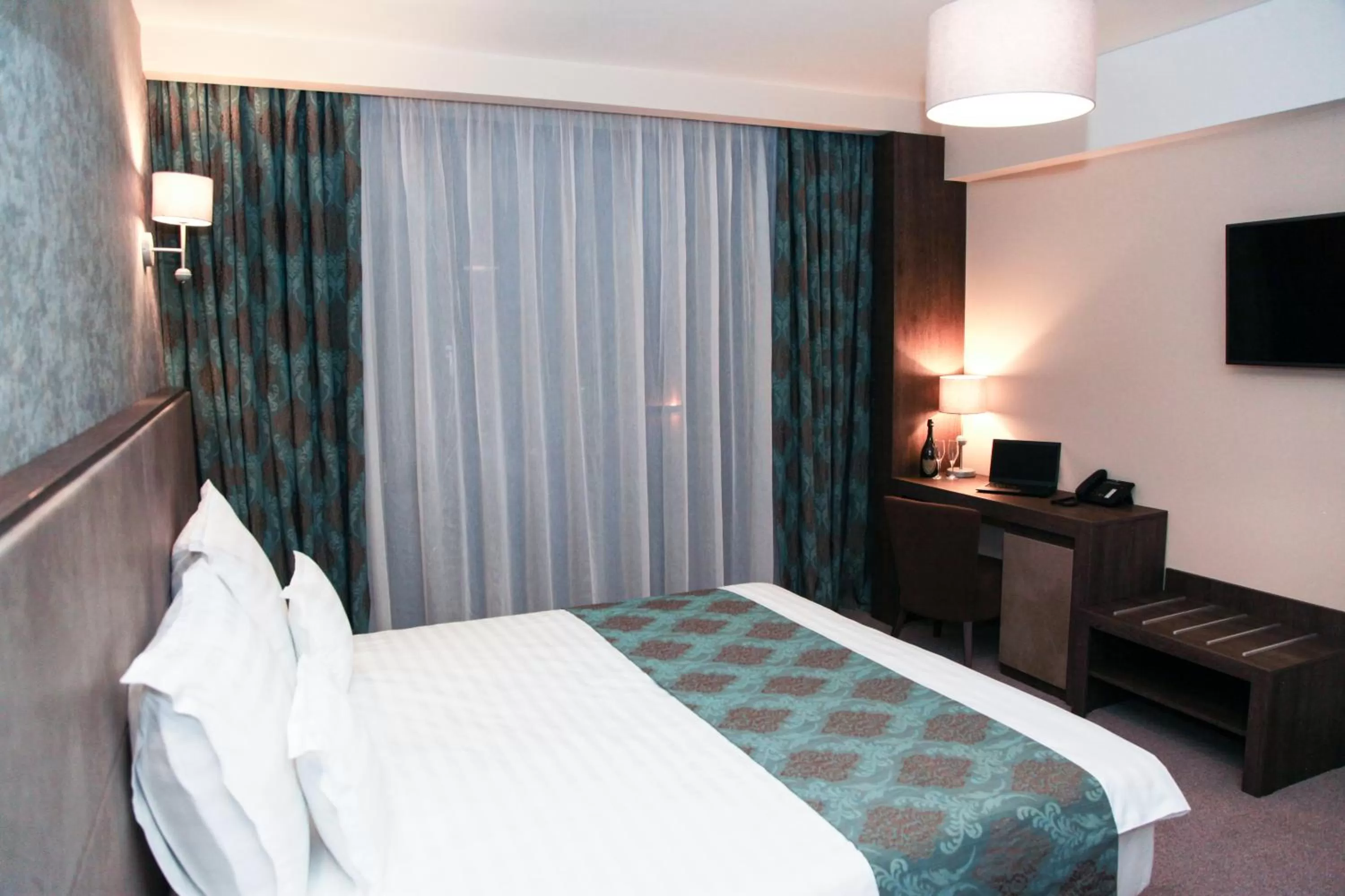 Photo of the whole room, Bed in Victoria Bulevard Hotel