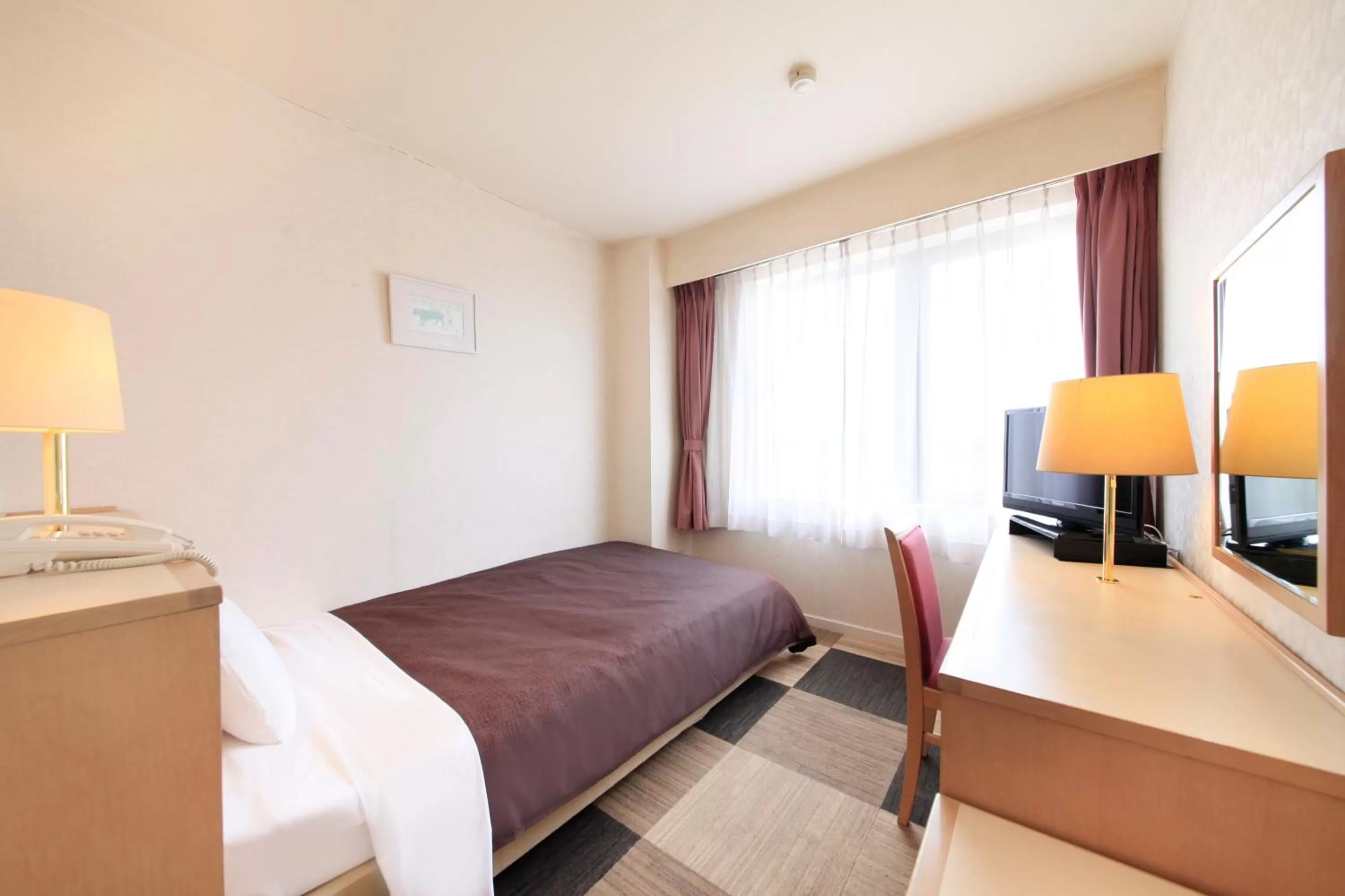 Photo of the whole room, Bed in Quintessa Hotel Iseshima