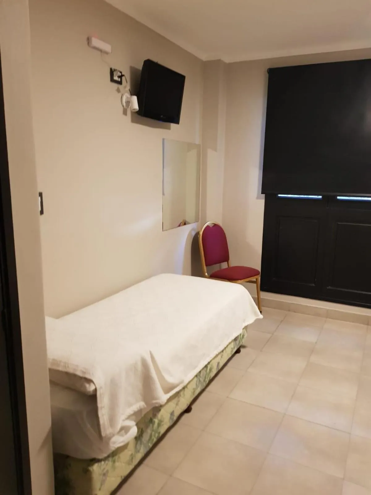 Bed in Hotel Marilian II