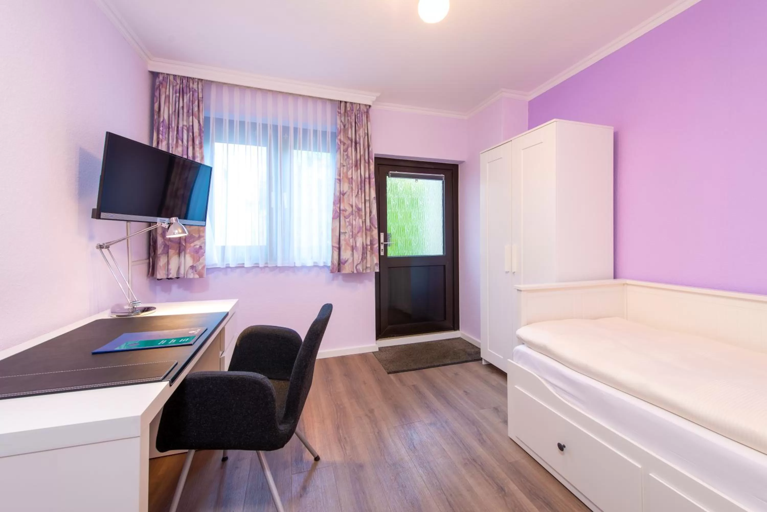 Bed in Hotel Heldt Dependance