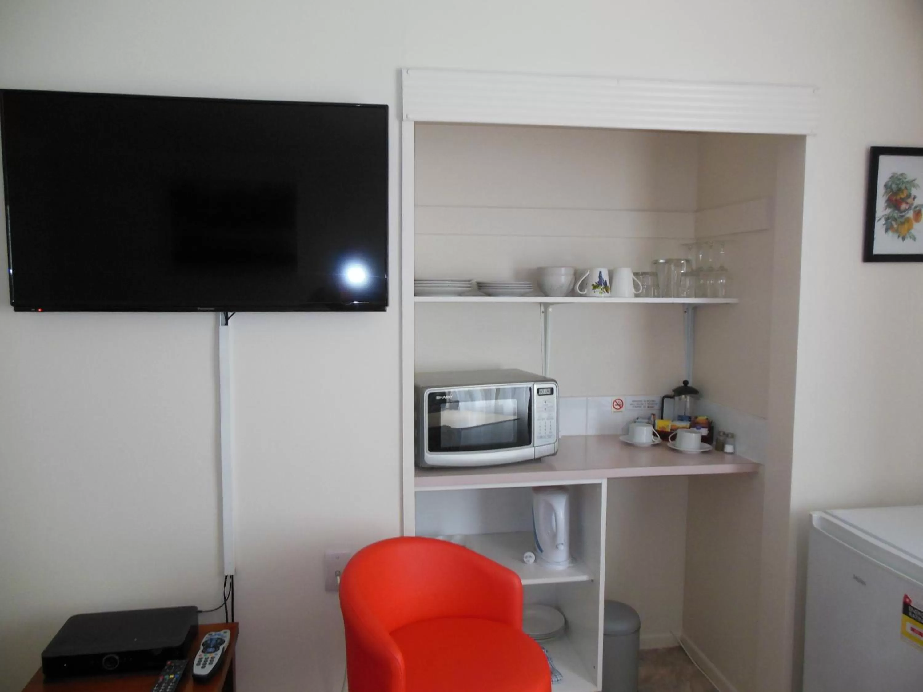 Kitchen or kitchenette in ASURE Camelot Arms Motor Lodge