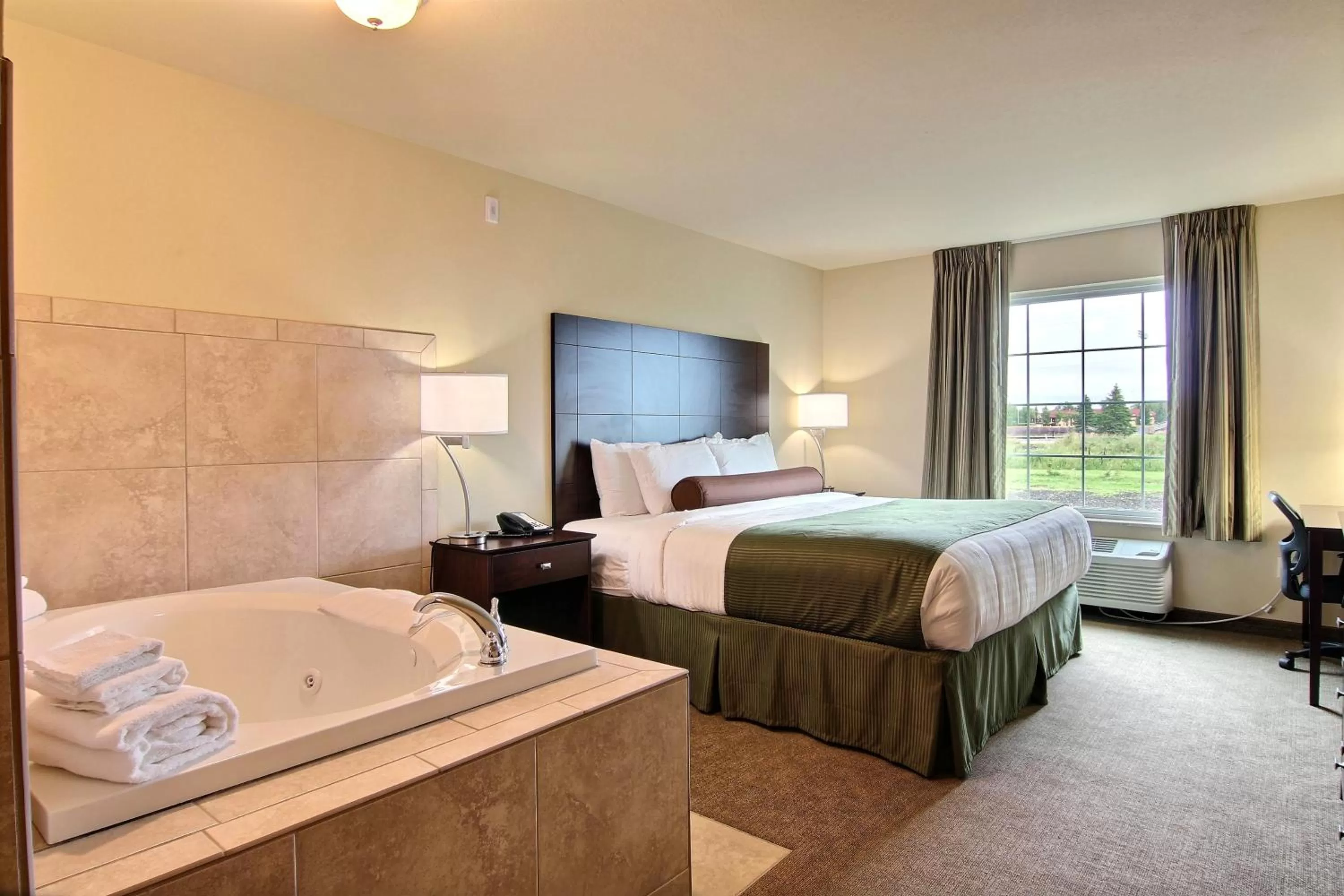 Bed in Cobblestone Hotel and Suites - Crookston