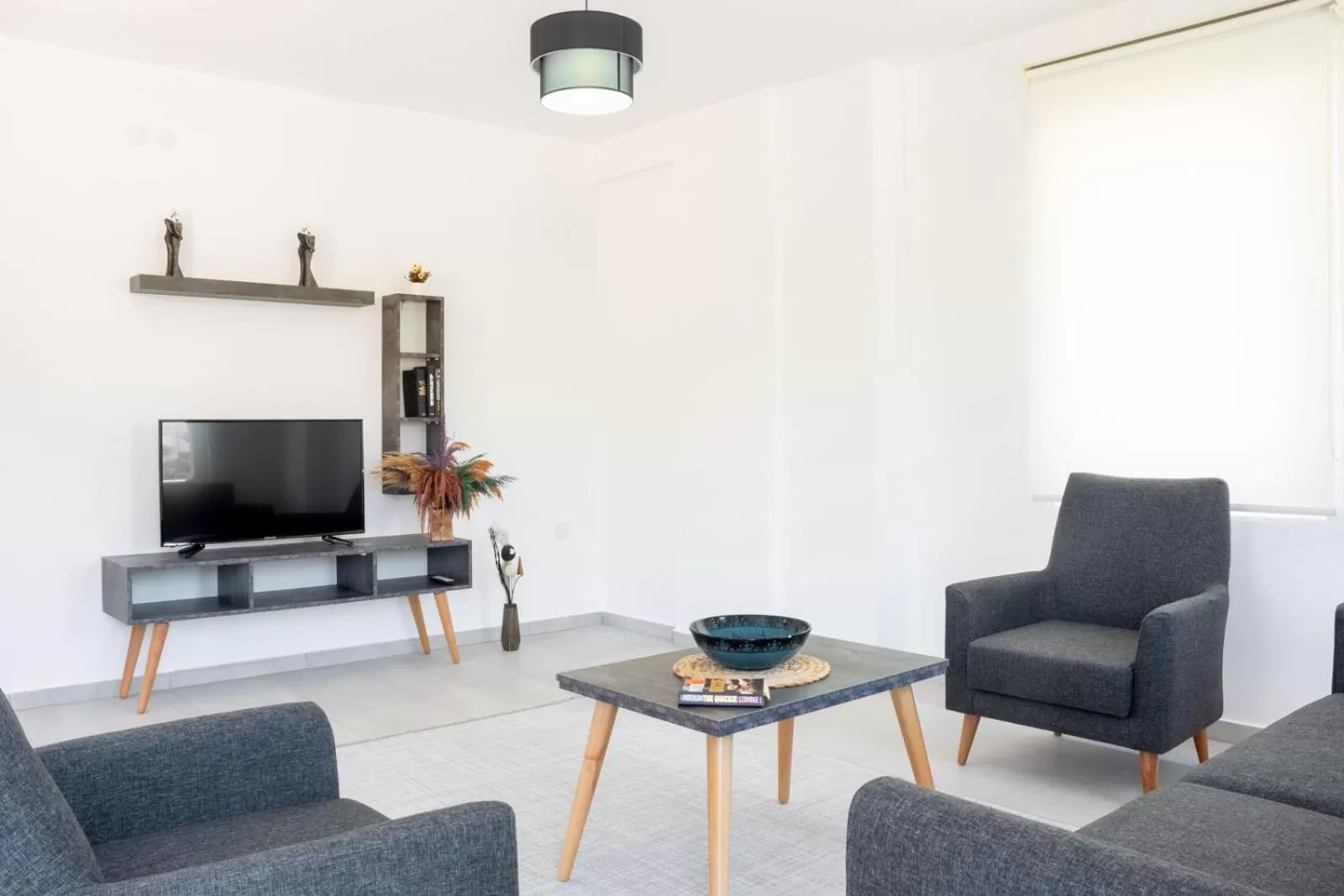 Communal lounge/ TV room in La Moda Aparts