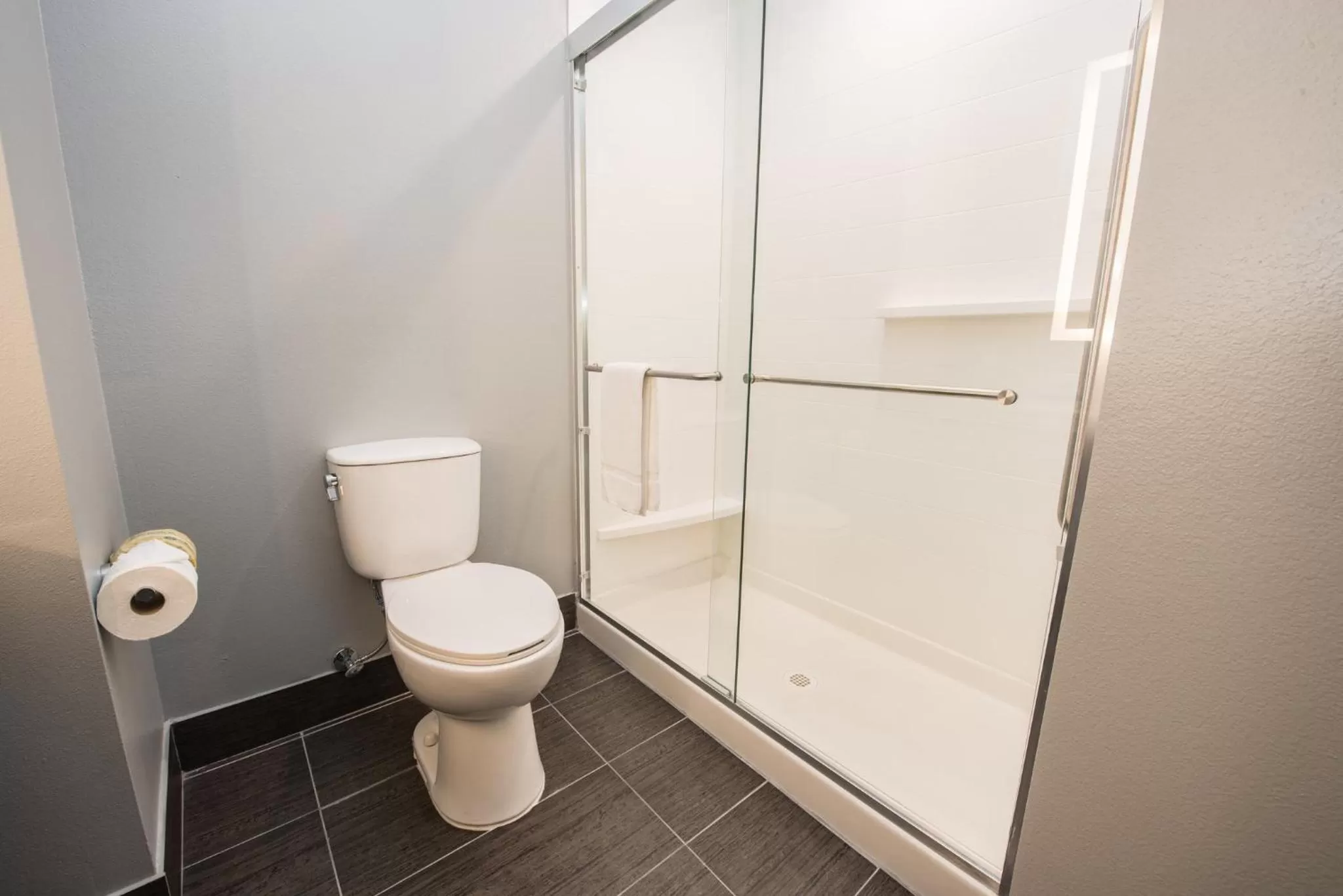 Toilet in Holiday Inn Express & Suites Houston - Hobby Airport Area by IHG