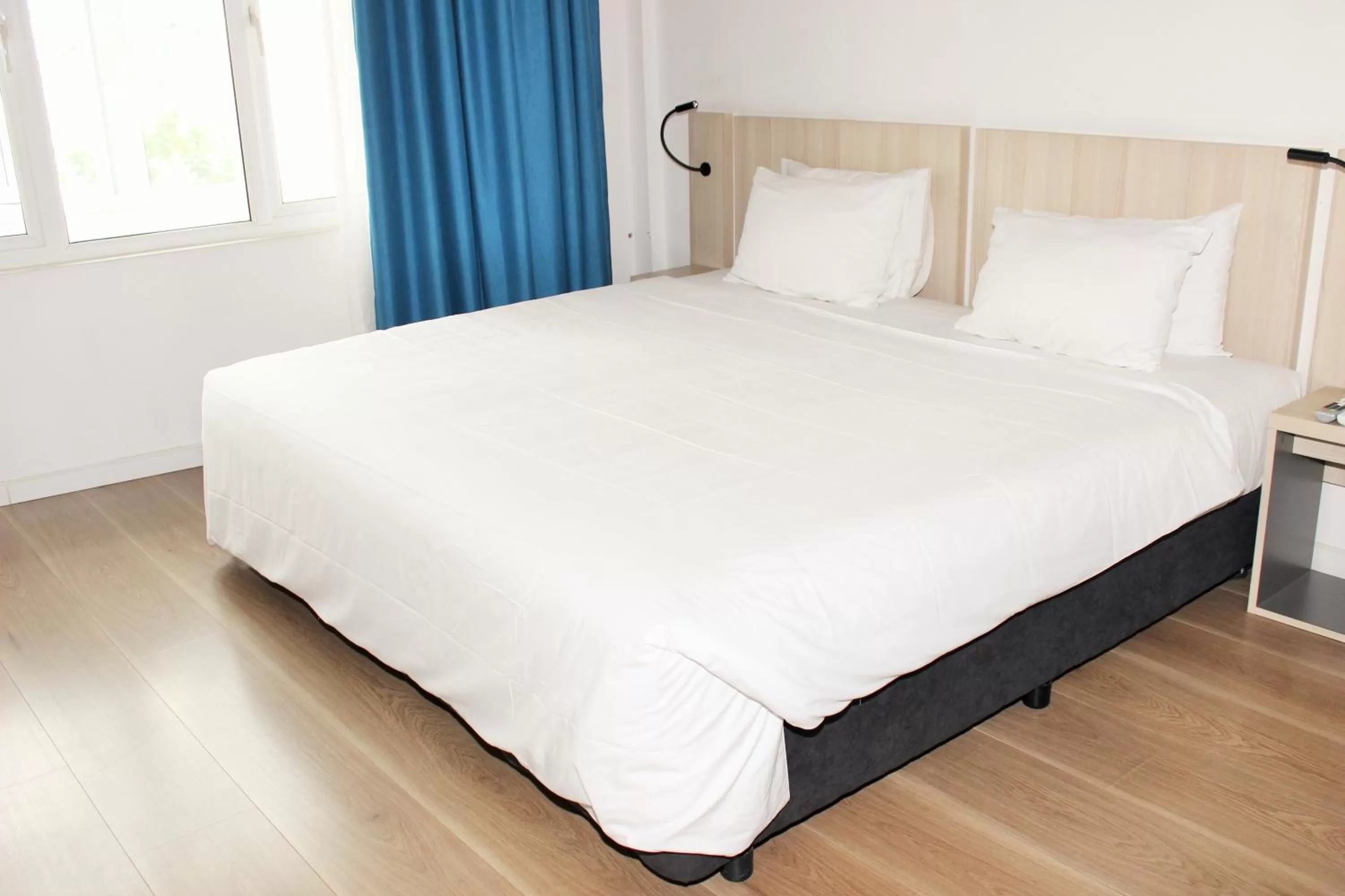 Bed in Liberty Hotel Saigon Greenview