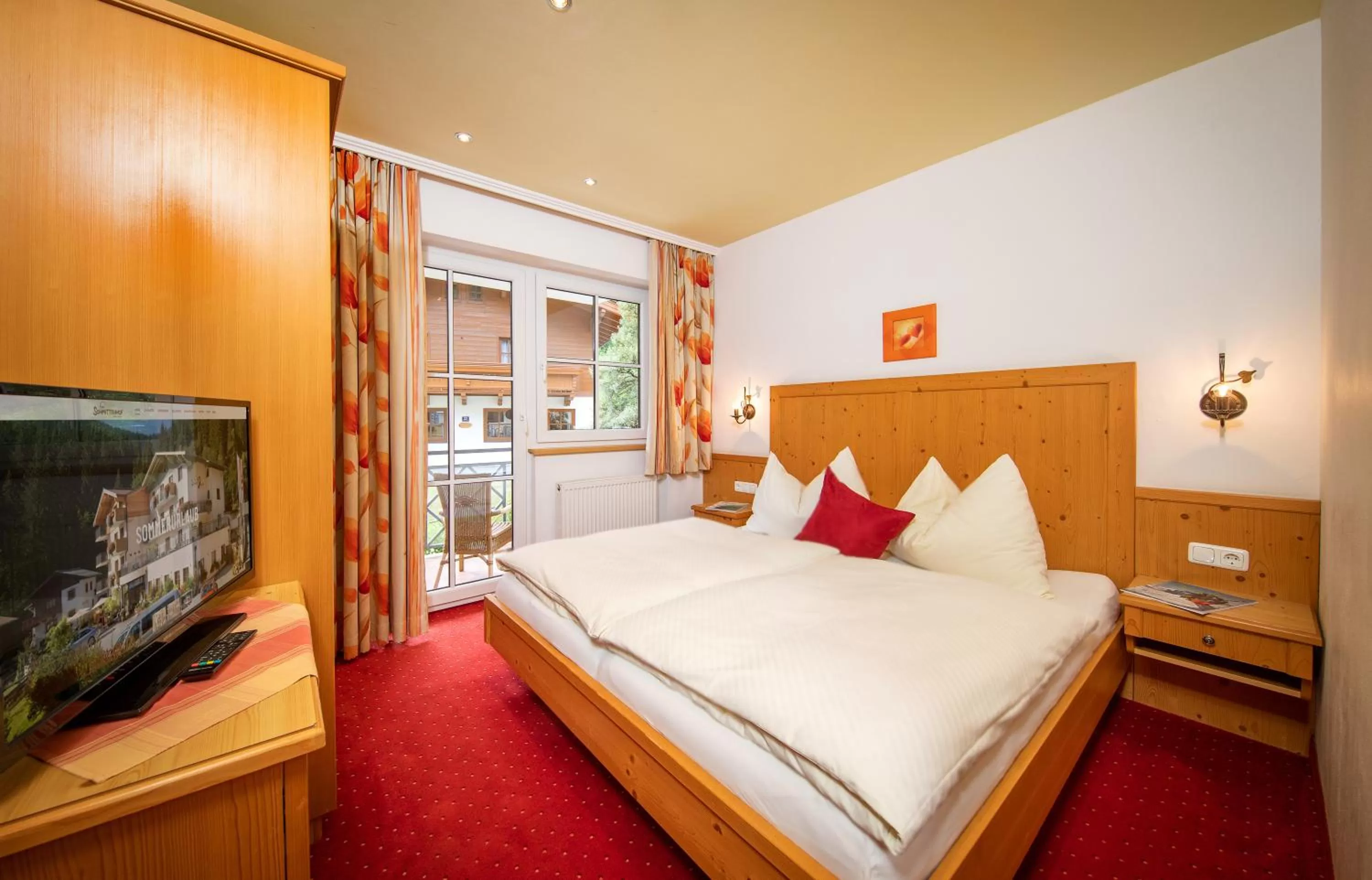 Photo of the whole room, Bed in Hotel Der Schmittenhof