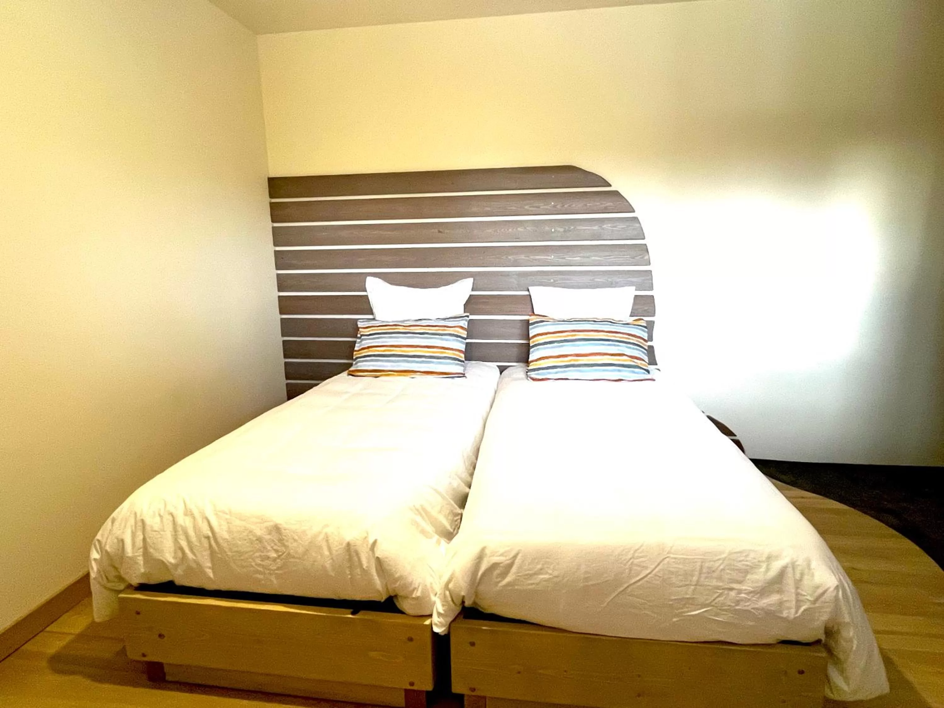 Bed in Hôtel En Tilleul