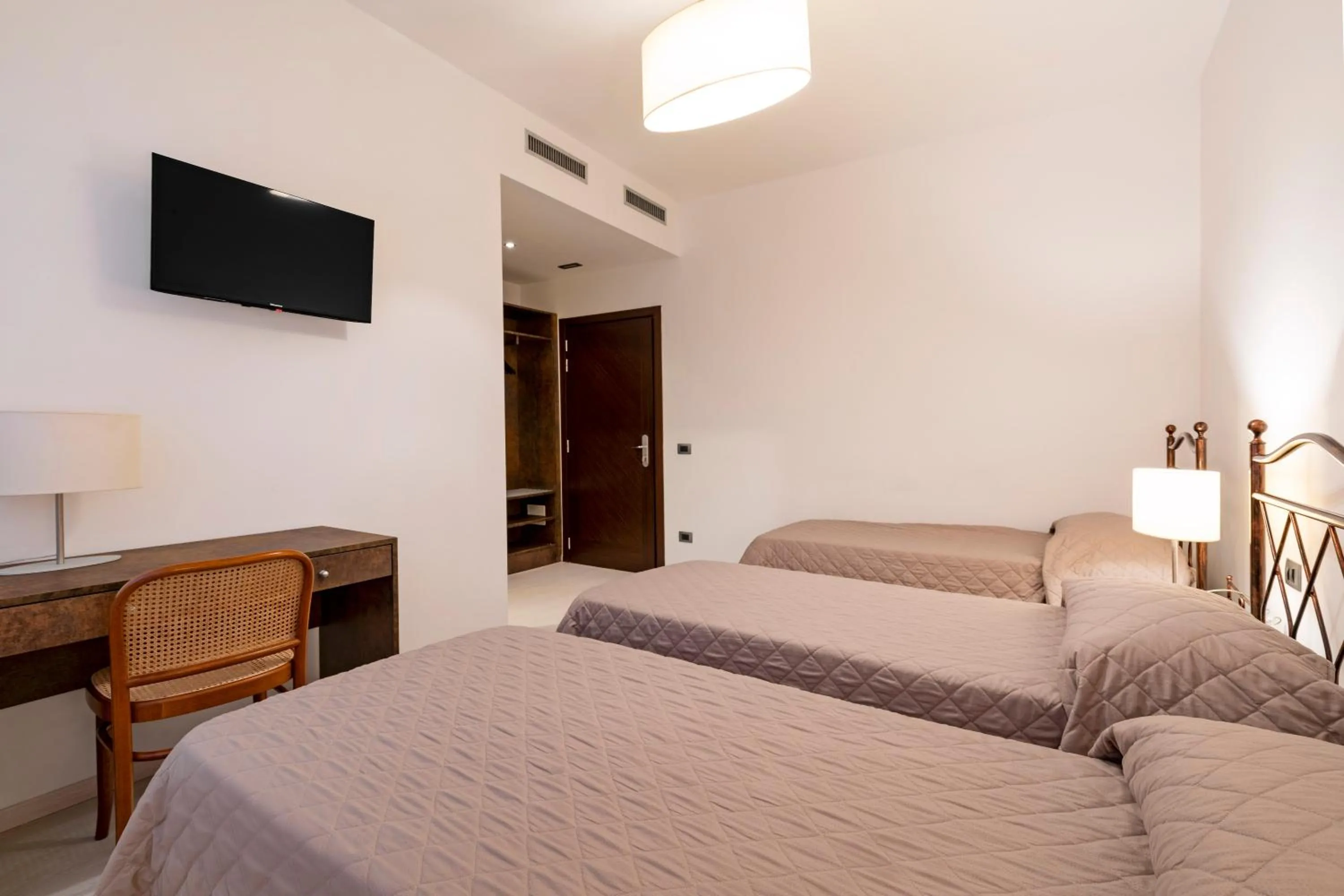 Bed in Hotel Sorriso