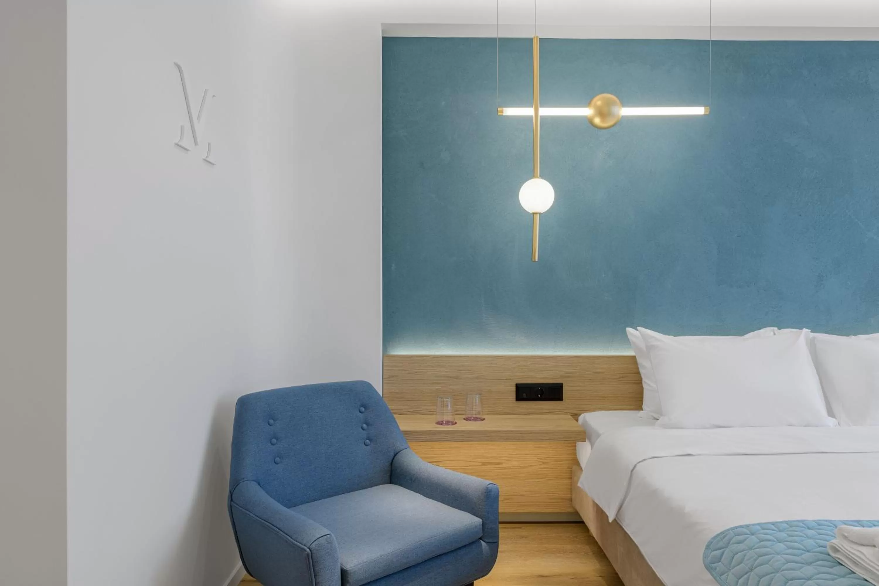 Bed in Acropolis Magenta Luxury Suites