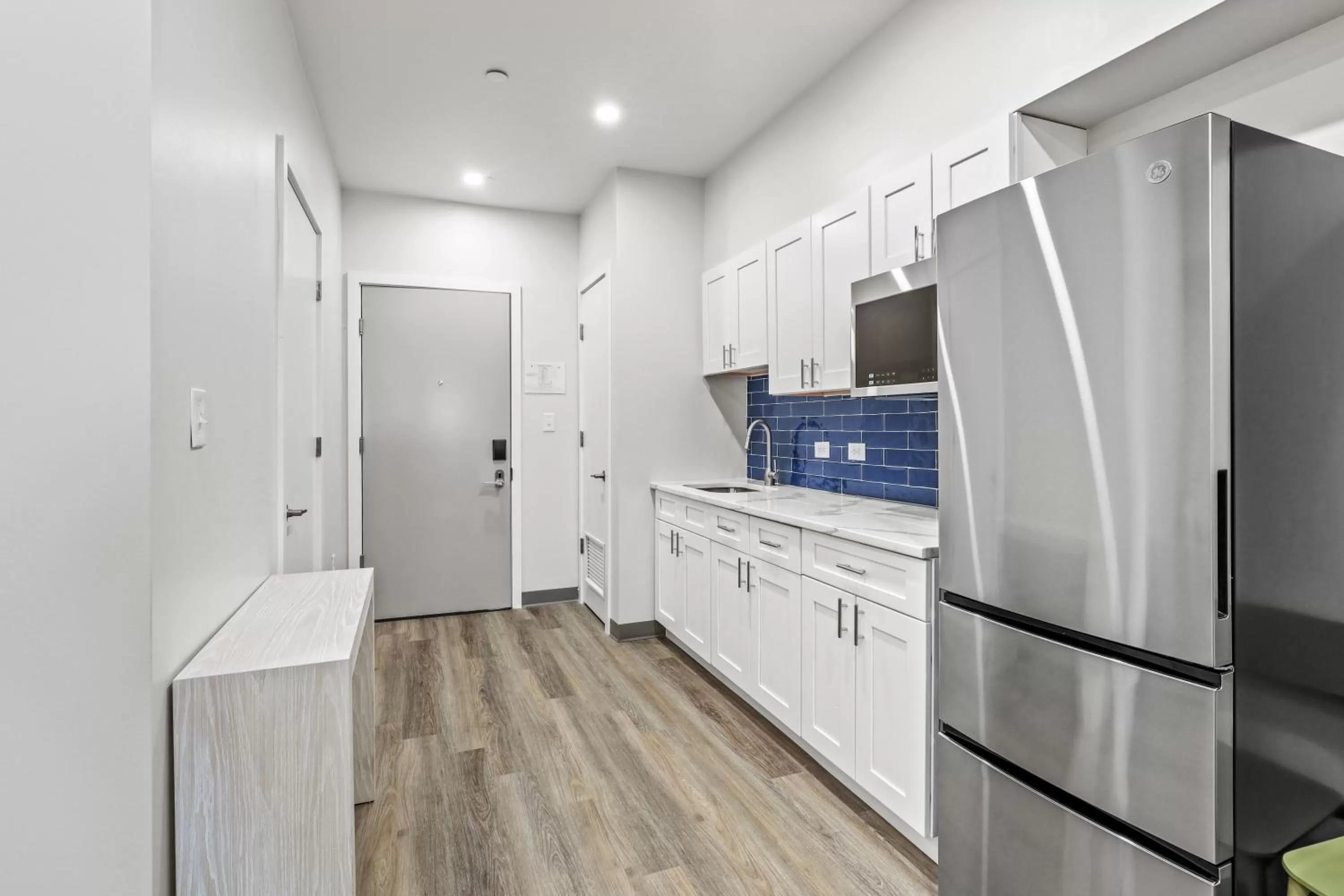 Kitchen or kitchenette in Seaport Suites