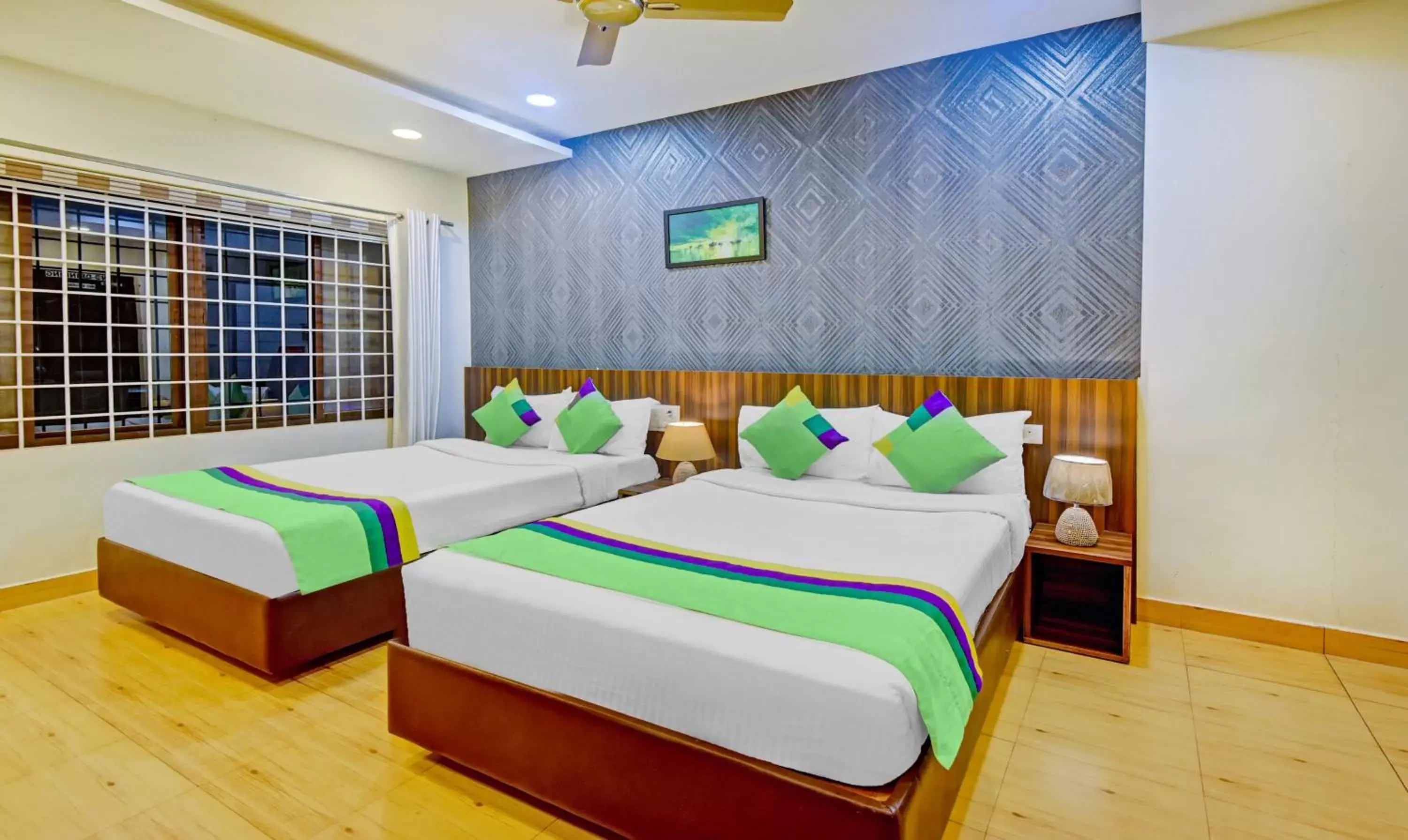 Deluxe Family Room in Itsy Hotels Igloo Residency Raja Seat Deluxe Family Room in Itsy Hotels Igloo Residency Raja Seat