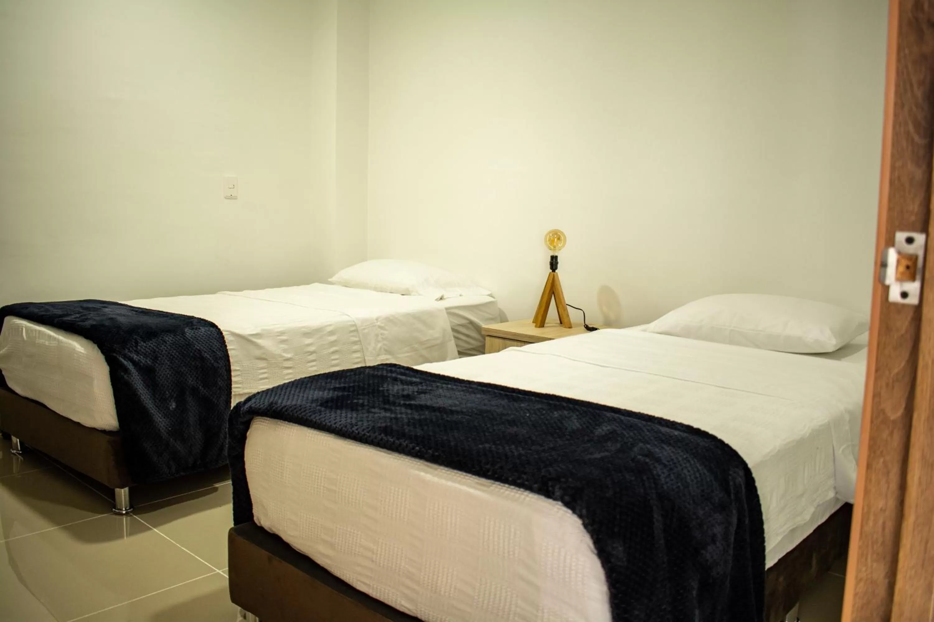 Bed in El Reloj Casa Hotel