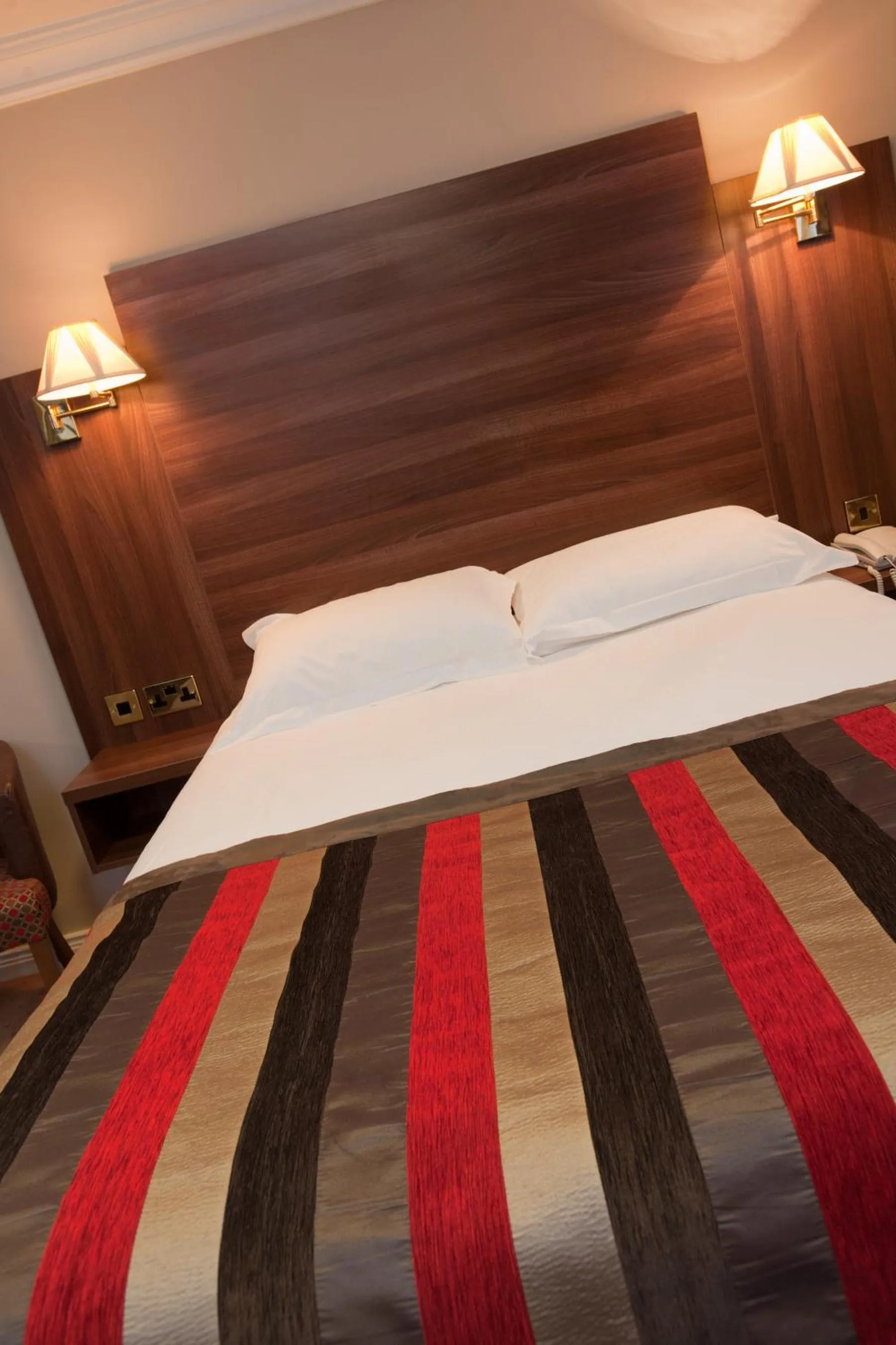 Bed in Adair Arms Hotel