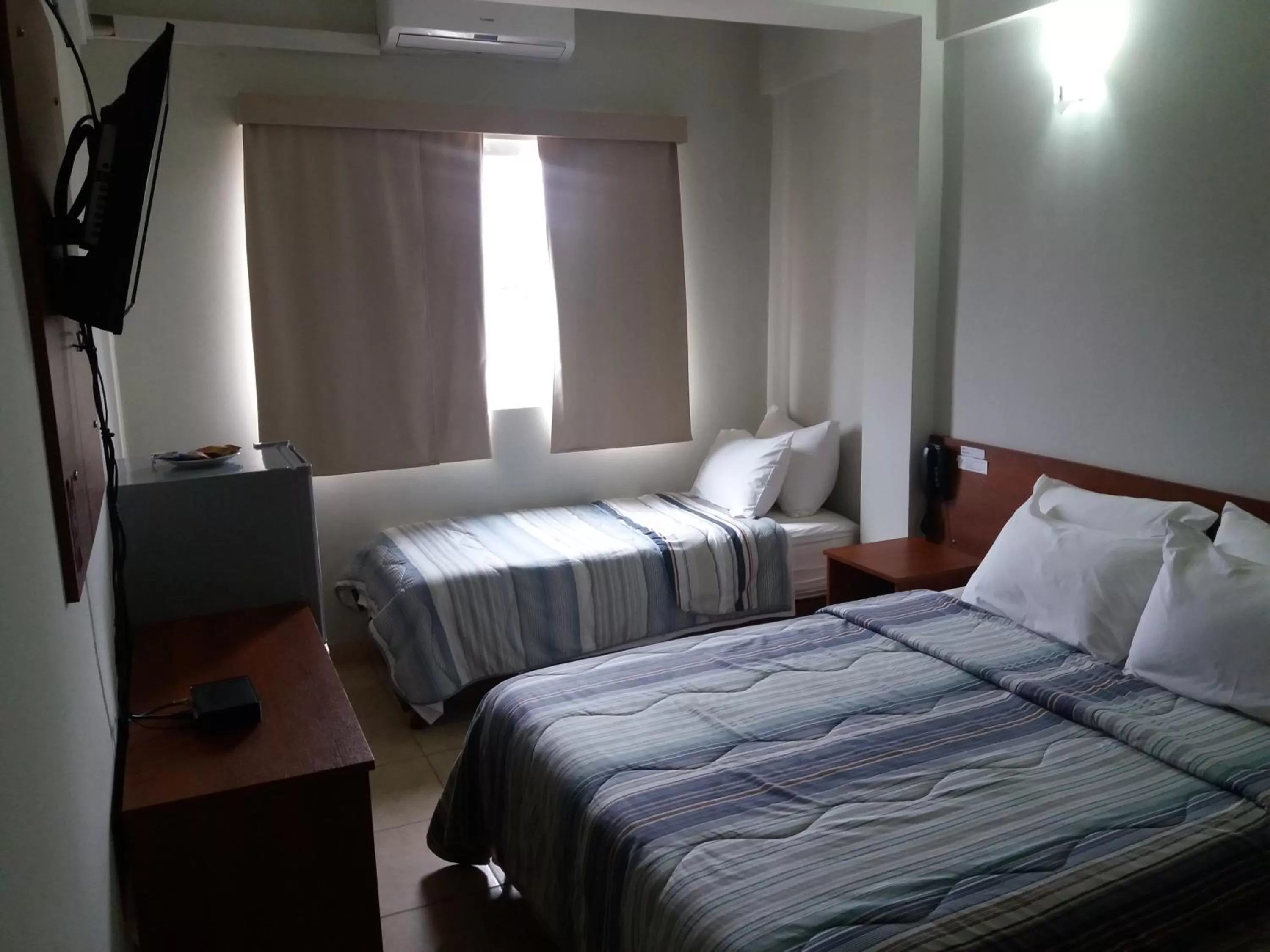 Bed in Madame Lynch Hotel Boutique