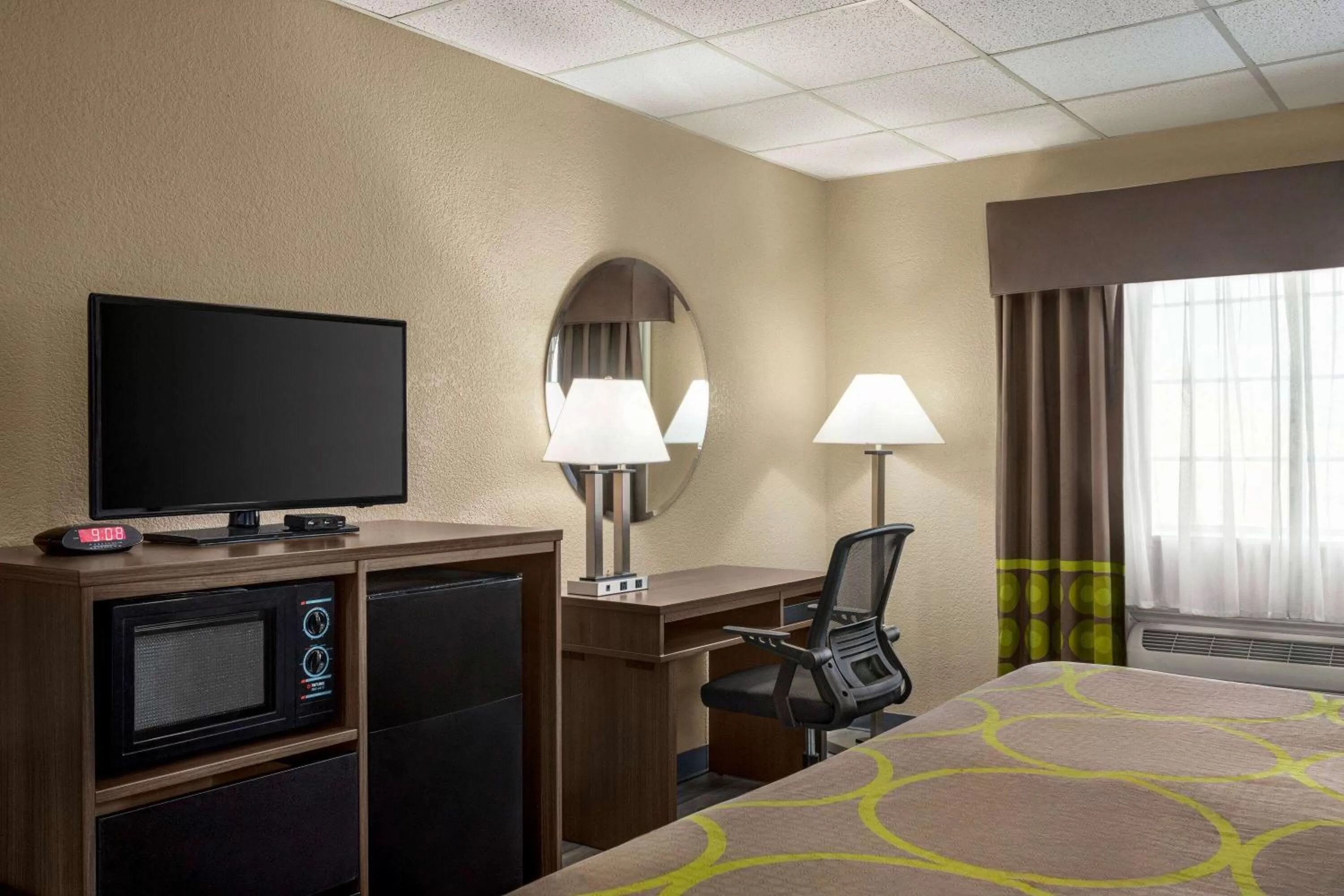 Photo of the whole room in Super 8 by Wyndham Gainesville TX
