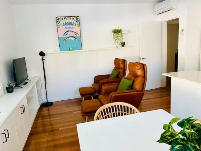 Seating area in BeachView Apartments at Villa Paradiso