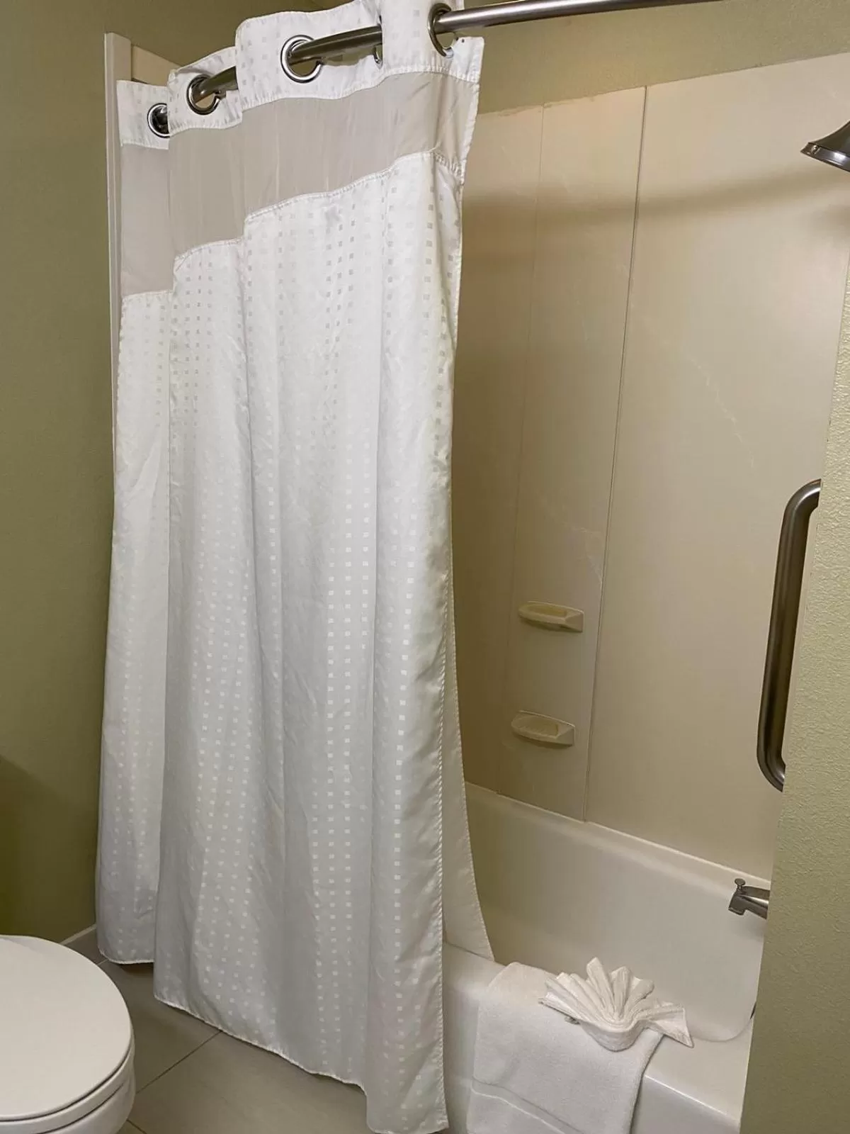 Shower in Hotel Marguerite South Anaheim - Garden Grove, Trademark Collection by Wyndham