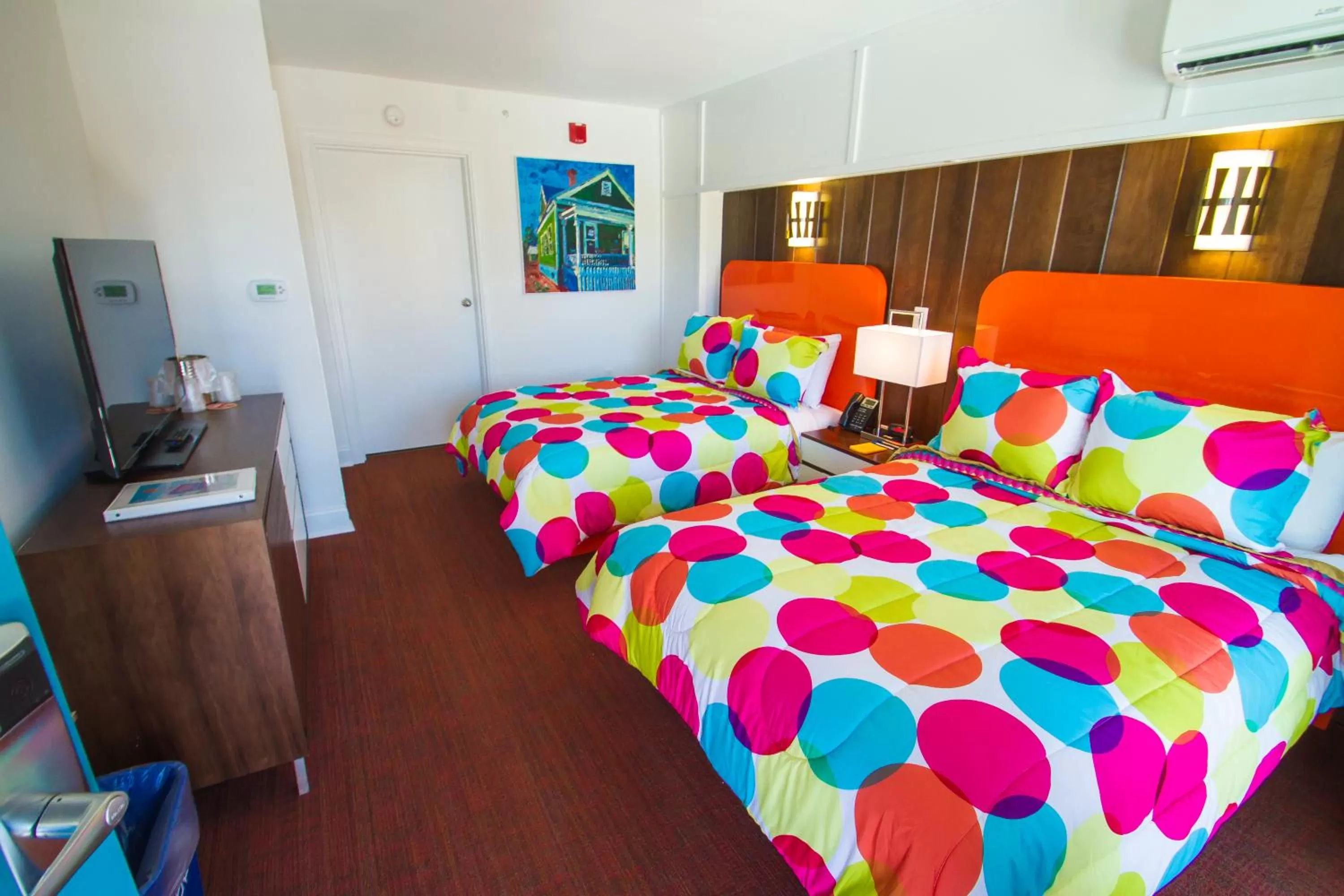 Bed in Mother Earth Motor Lodge