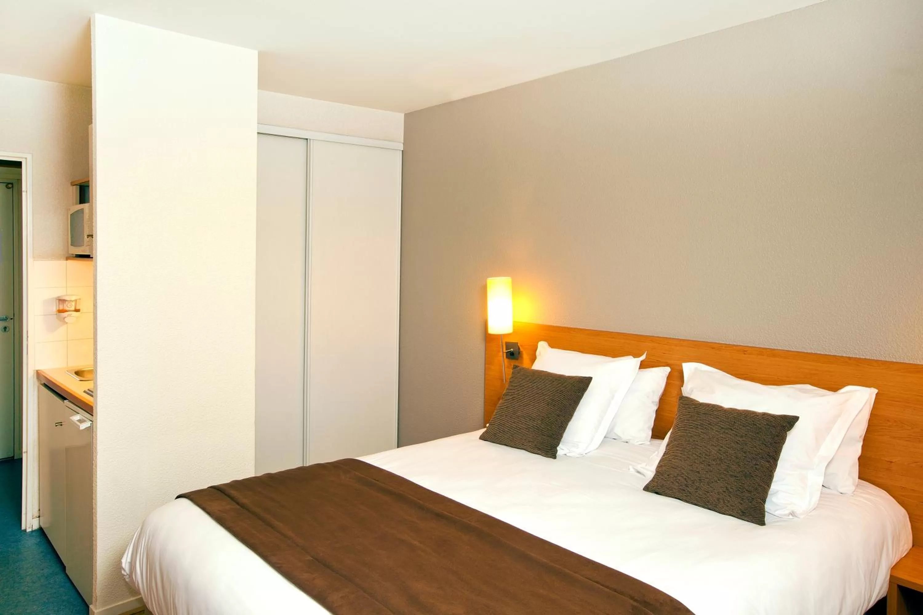 Bedroom, Bed in Séjours & Affaires Rennes de Bretagne