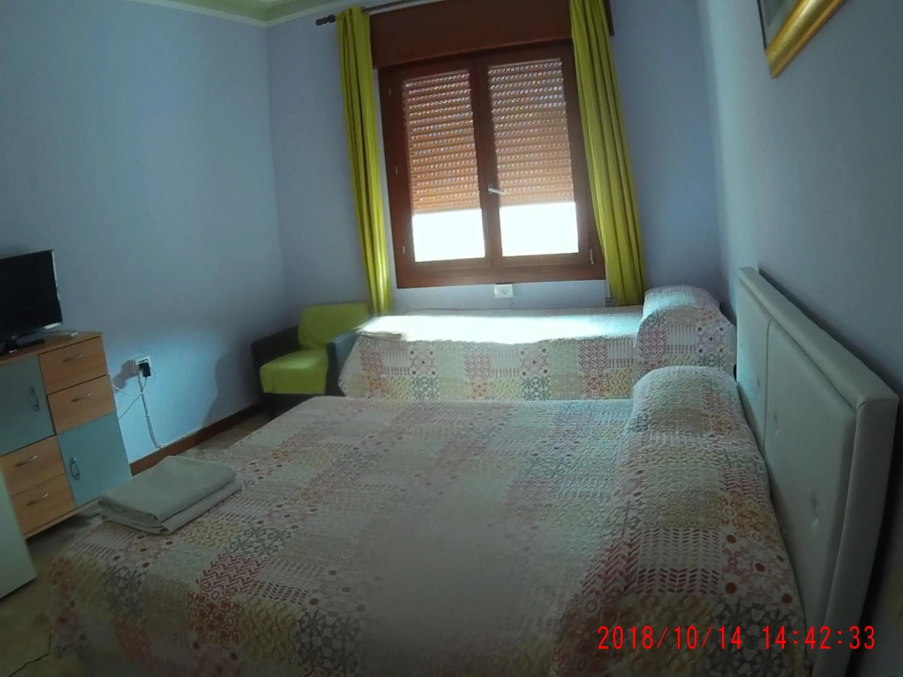 Photo of the whole room, Bed in The Caponi Bros