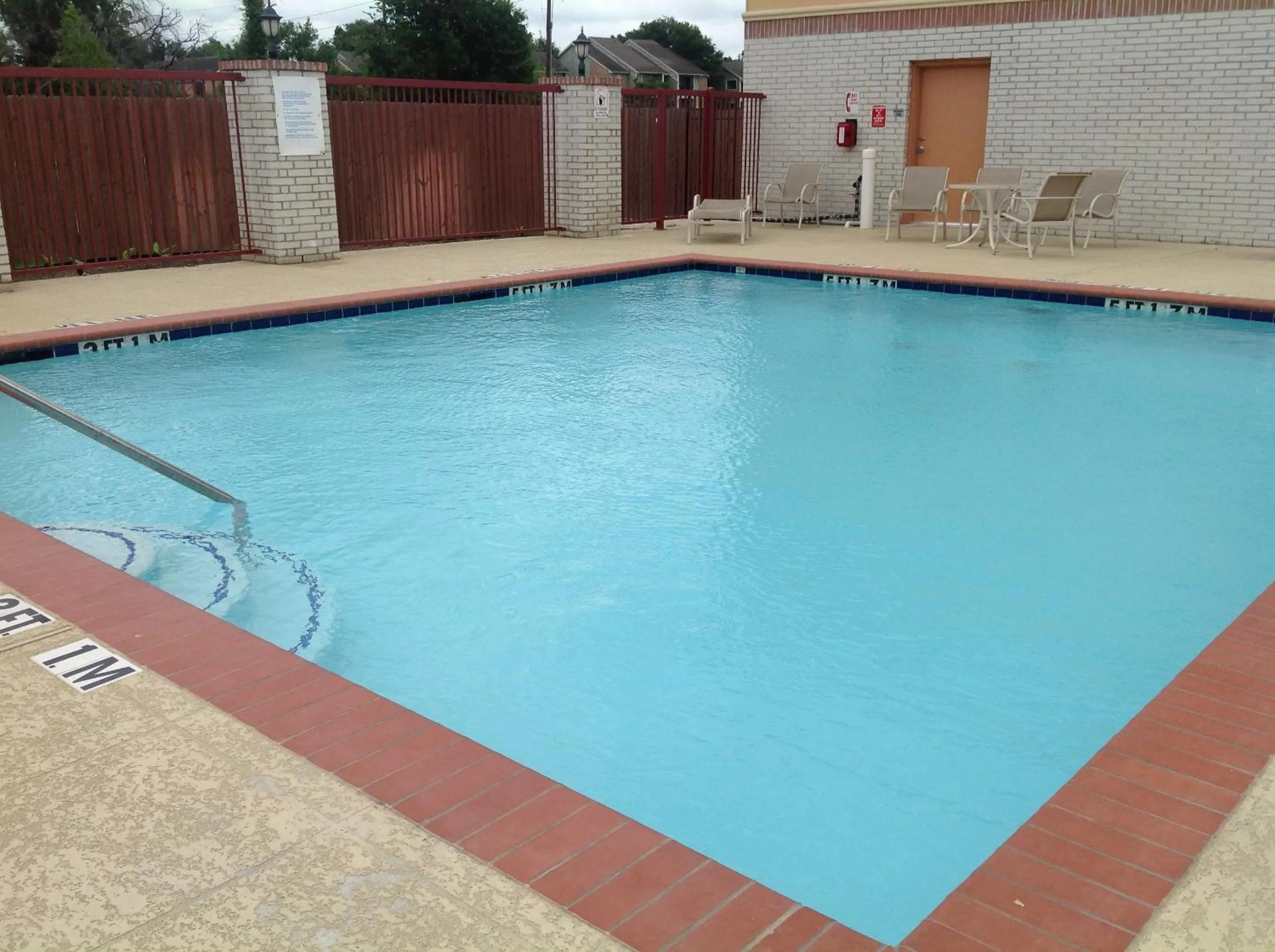 Swimming pool in Scottish Inns & Suites Timber Creek, Houston, TX