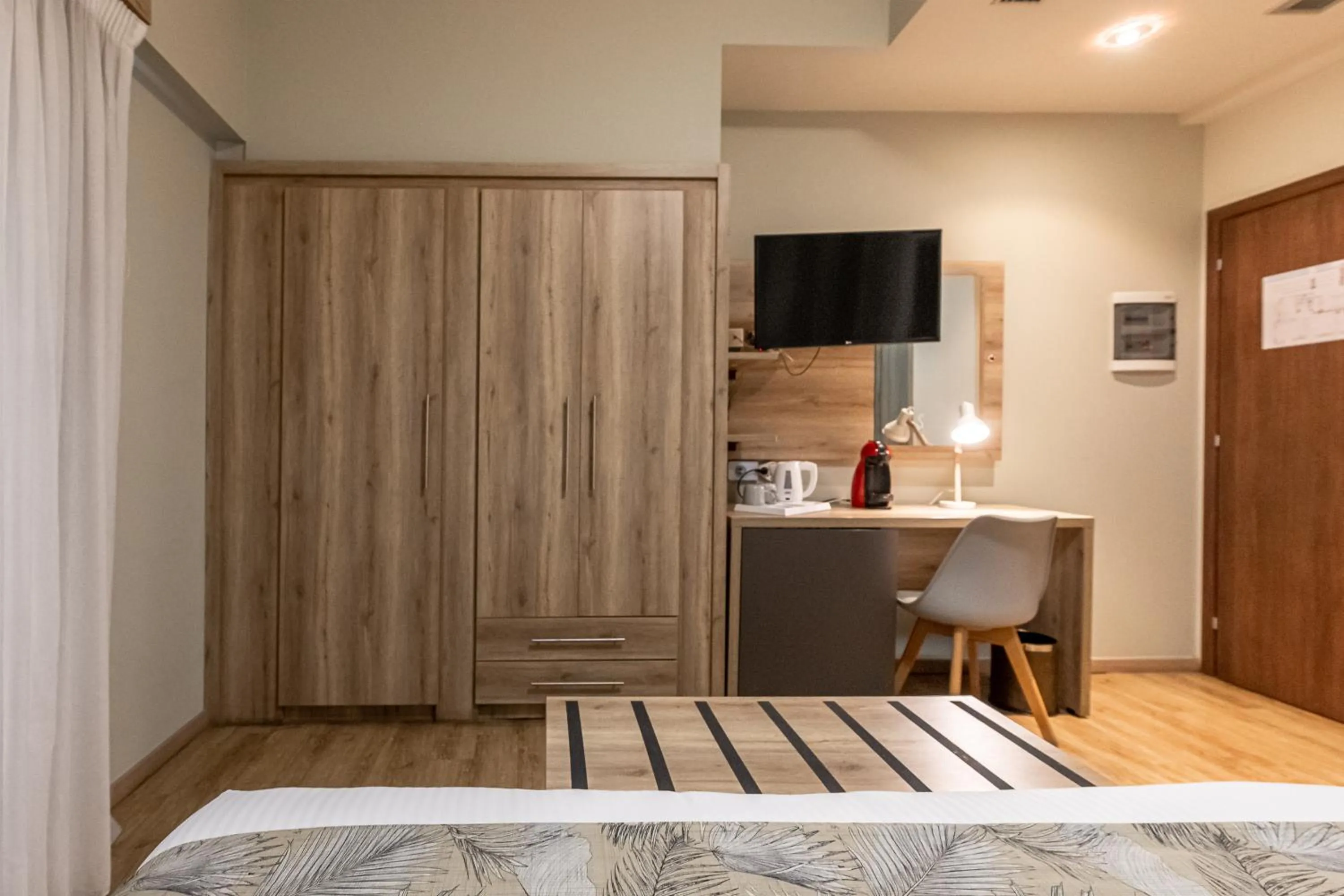 Bed in Hotel @Syngrou Fix