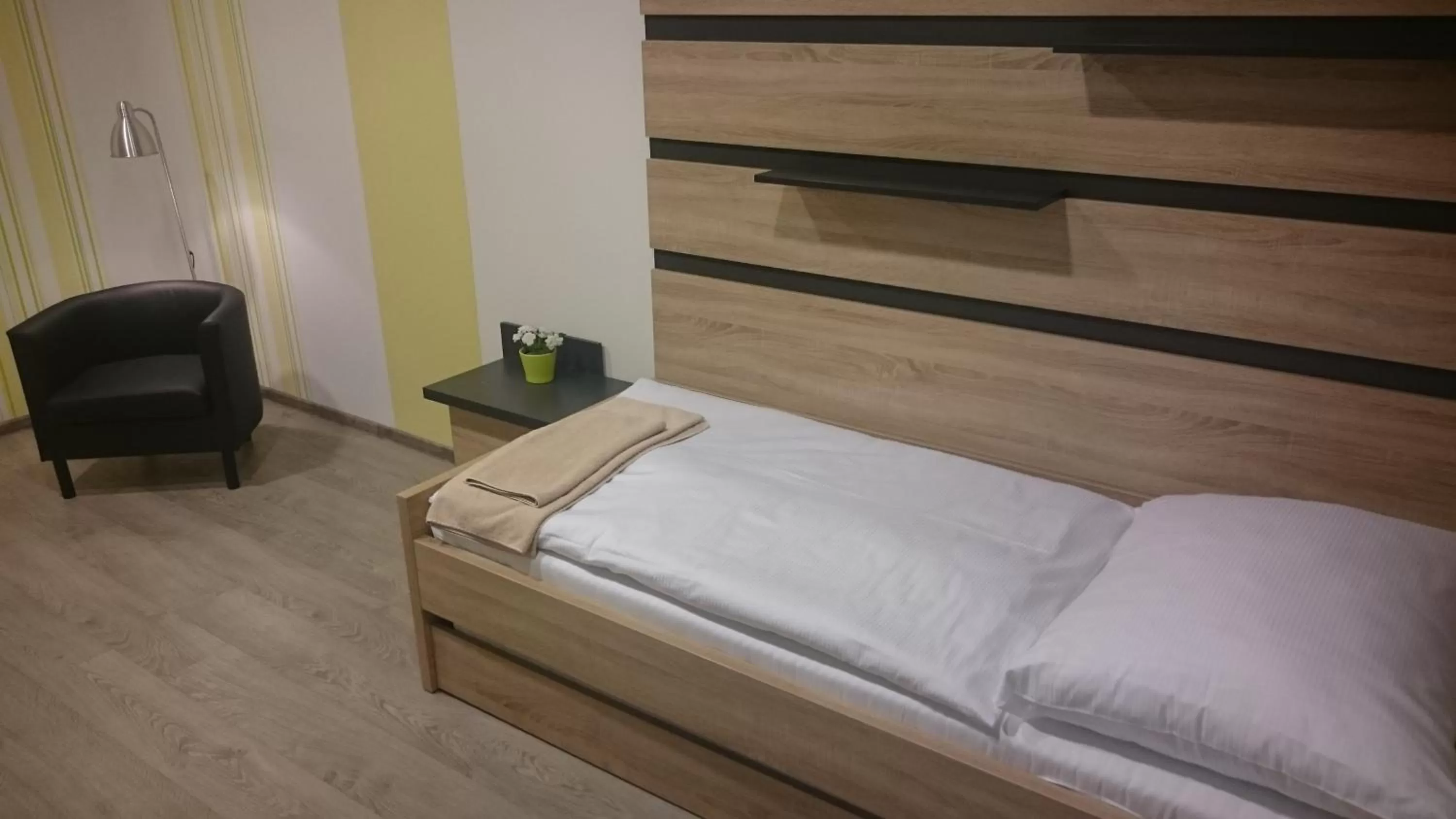 Photo of the whole room, Bed in TaM Autohof Malacky