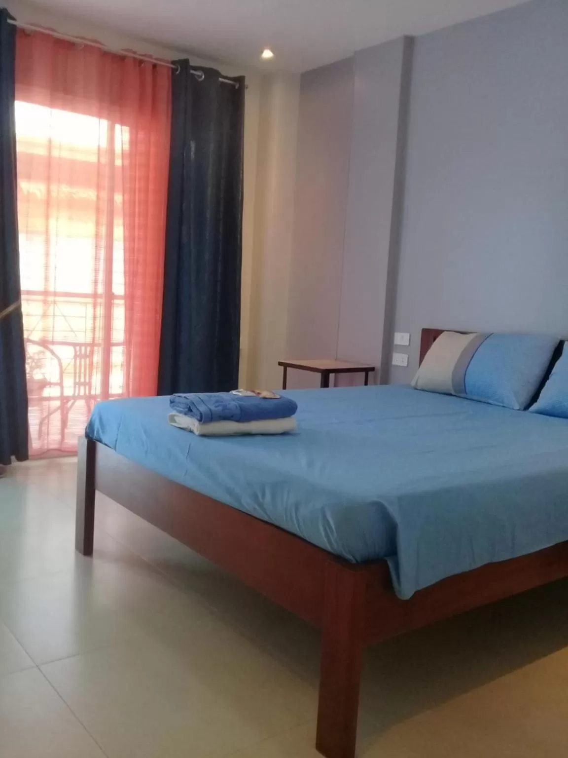 Photo of the whole room, Bed in D & B BLUESTAR BEACH RESORT