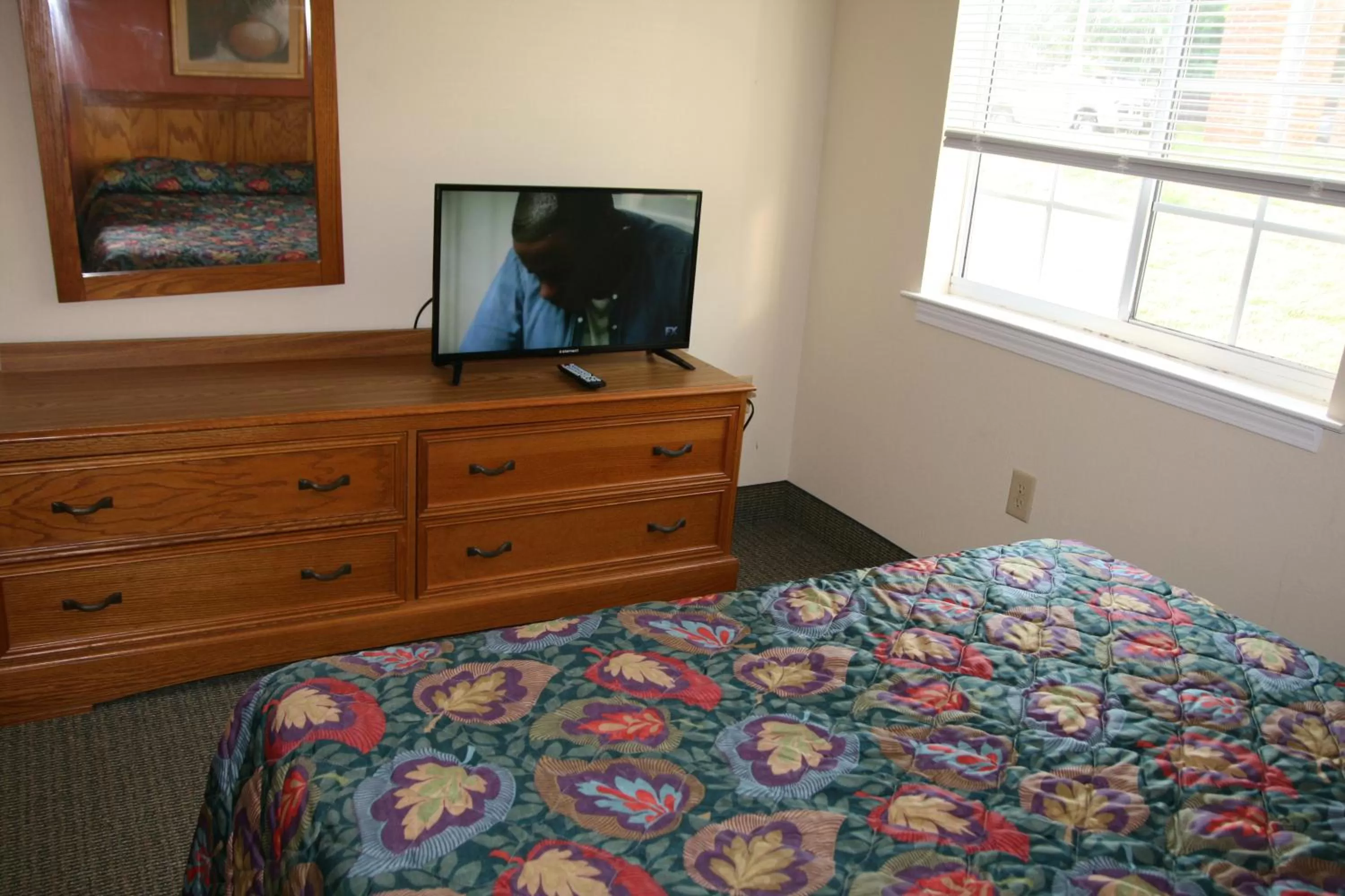 Bed in Affordable Suites Rocky Mount