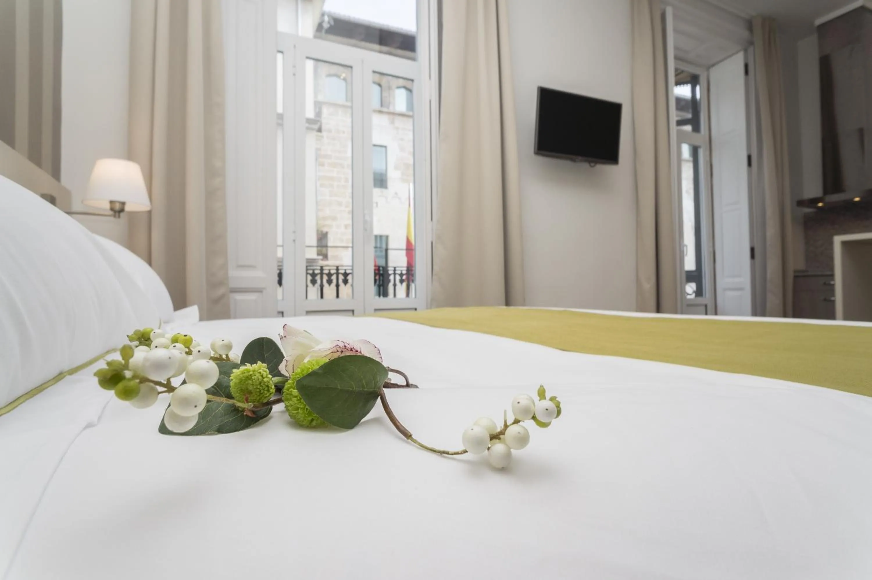 Bed in Hotel San Lorenzo Boutique Plaza