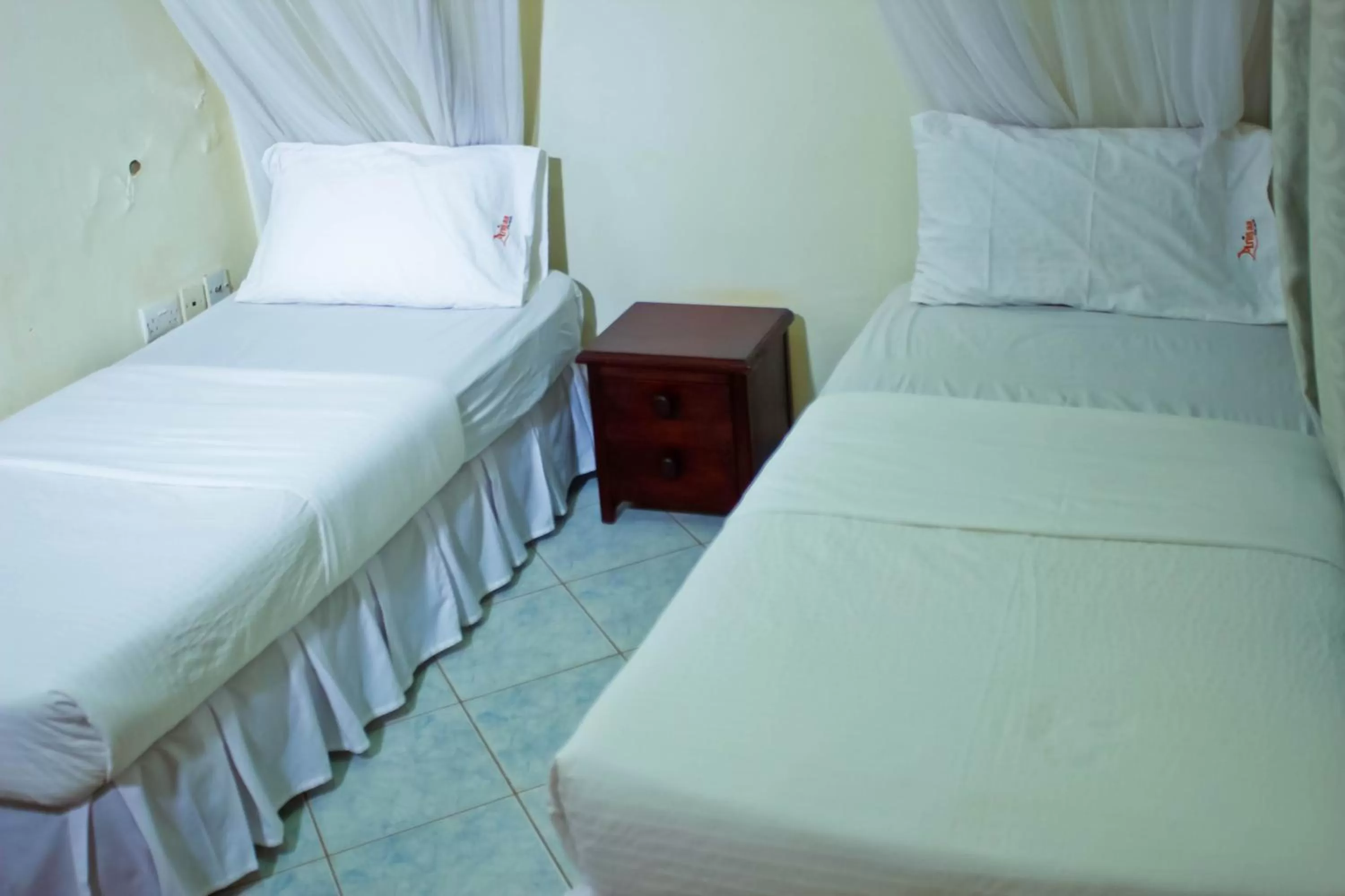 Bed in Al-Nisaa Hotel and Spa
