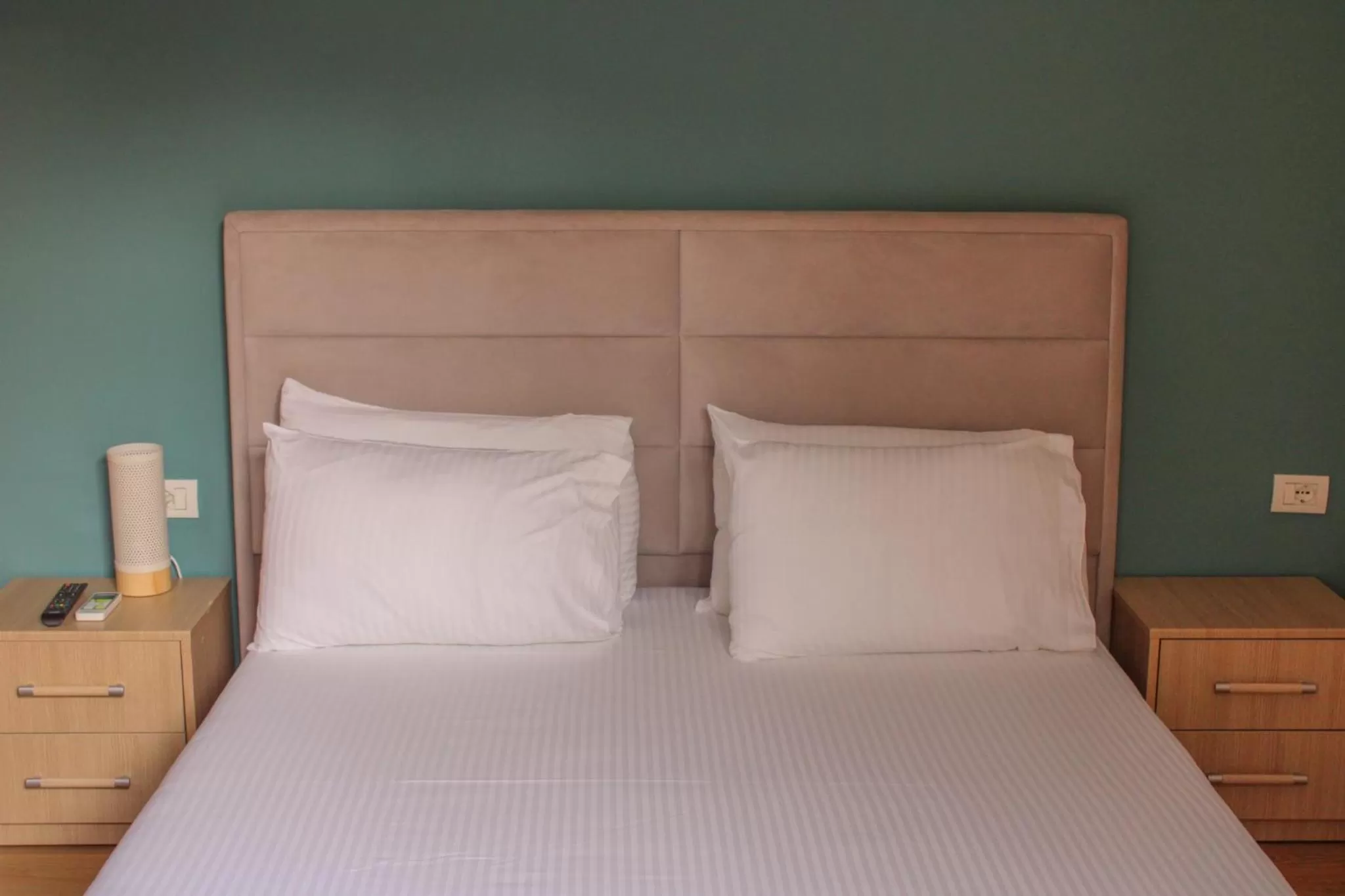 Bed in Aphrodite Garden Rooms & Apartment