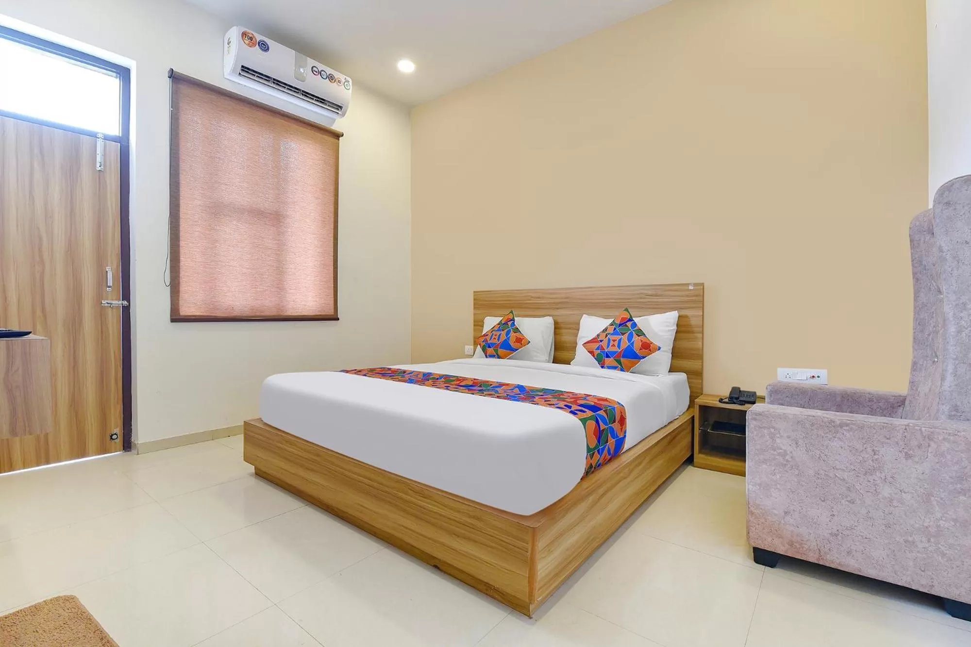 Bed in FabHotel Prime Oxus