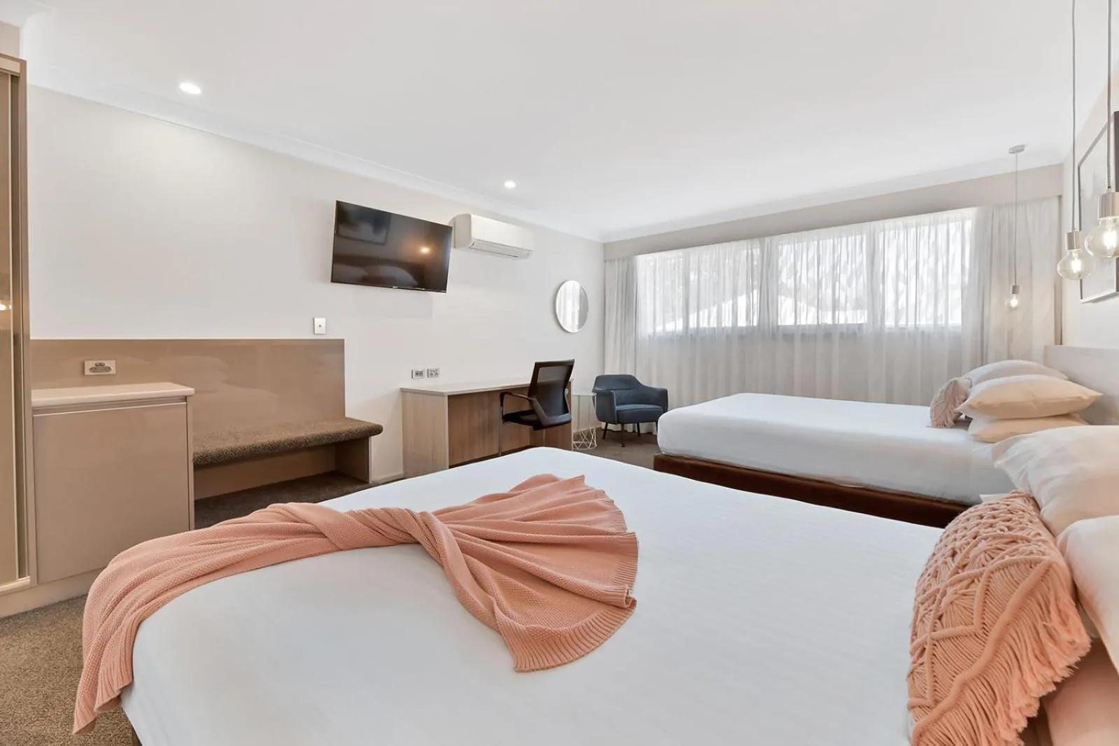 Bed in Central Caleula Motor Lodge