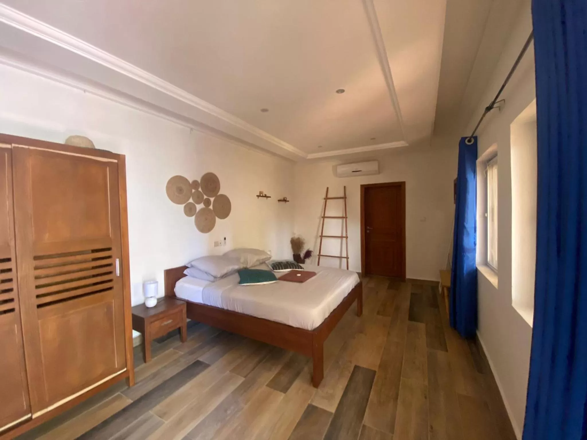 Bed in L'Oasis Guesthouse