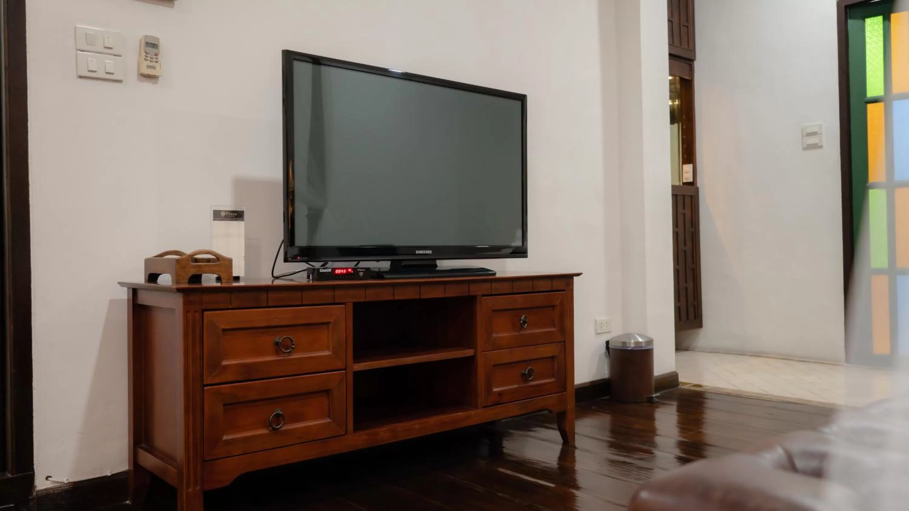 Decorative detail, TV/Entertainment Center in Cheva Gallery Boutique Hotel