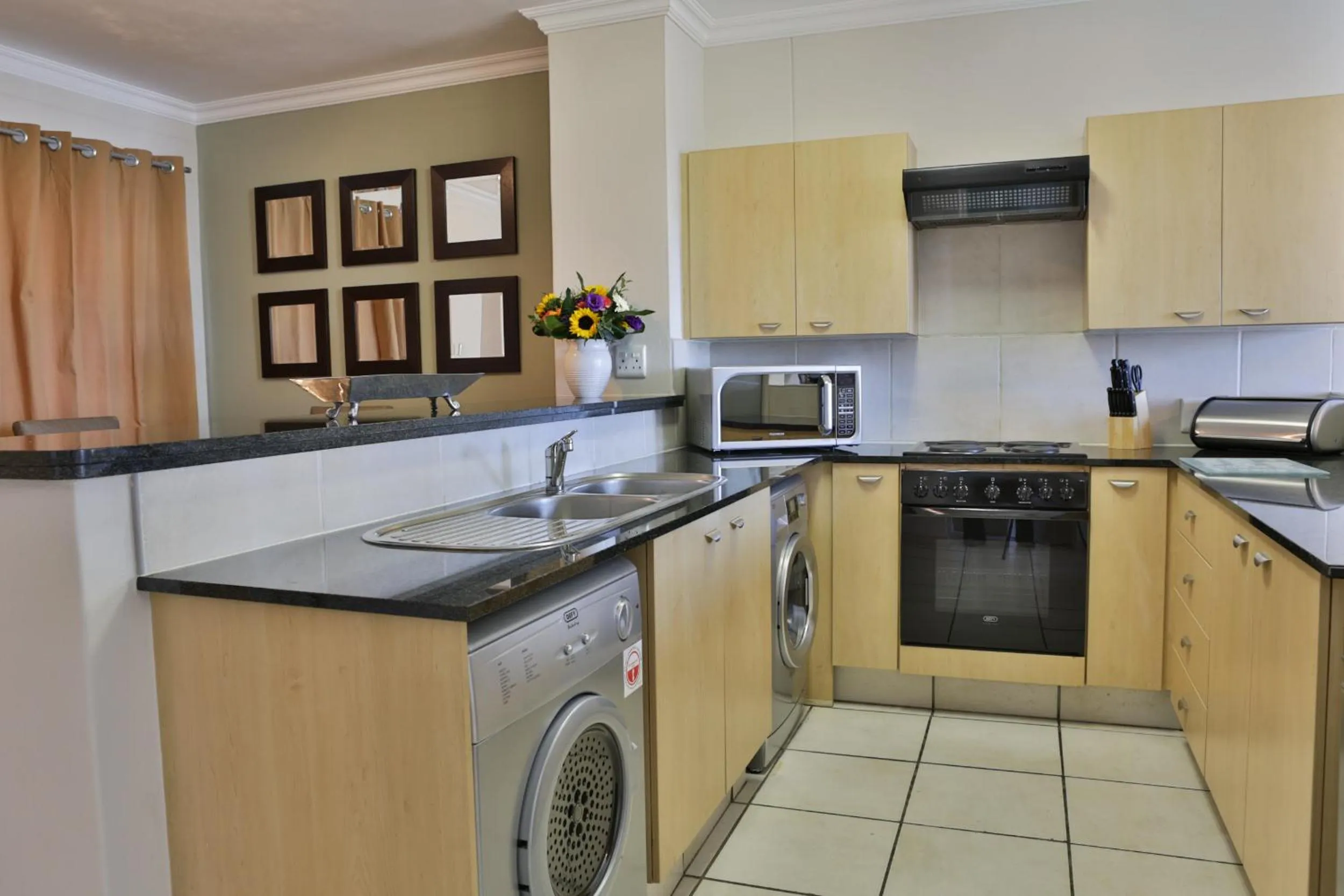 Kitchen or kitchenette in WeStay Westpoint Apartments