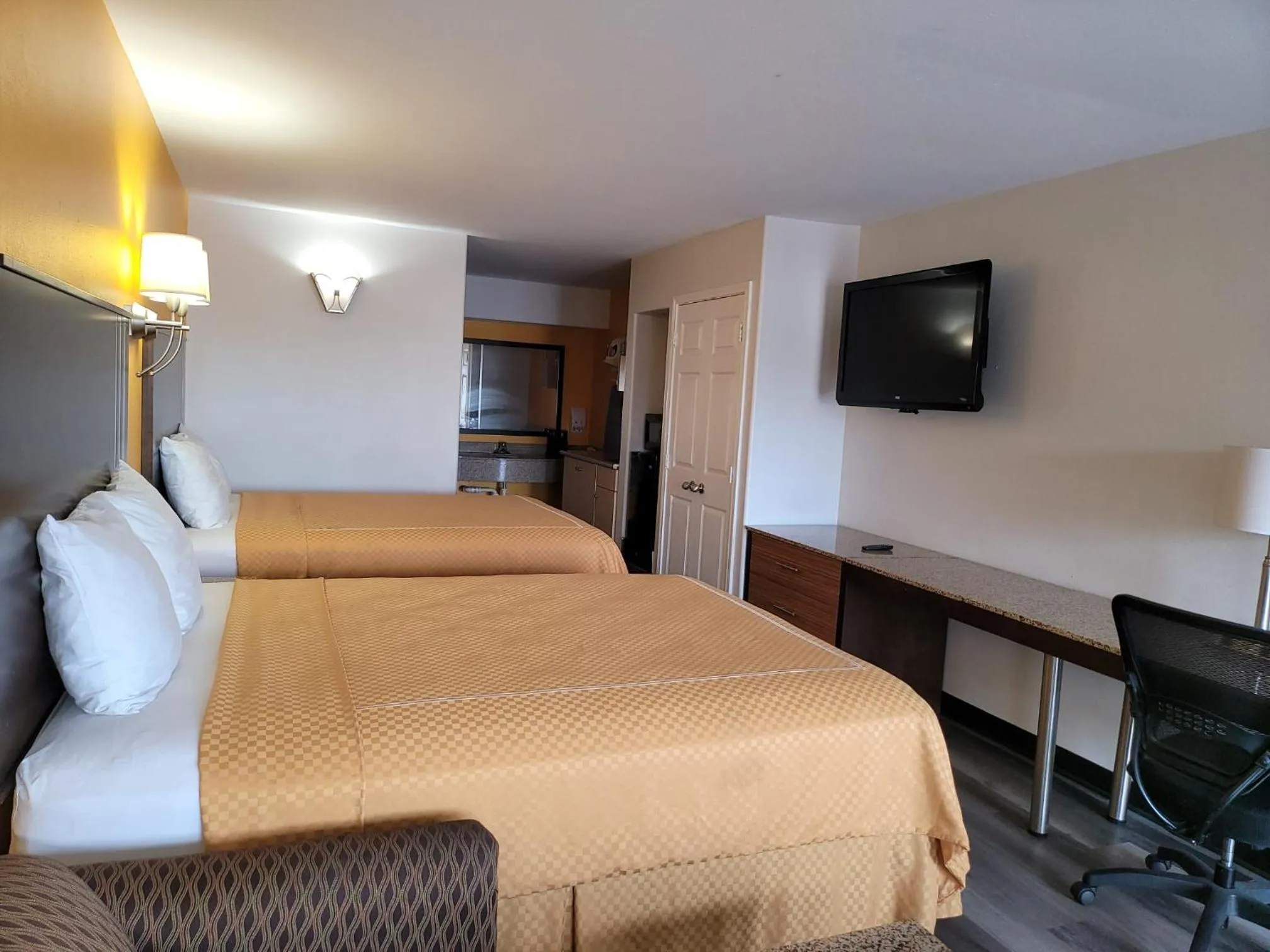 Bed in Texas Inn and Suites Raymondville