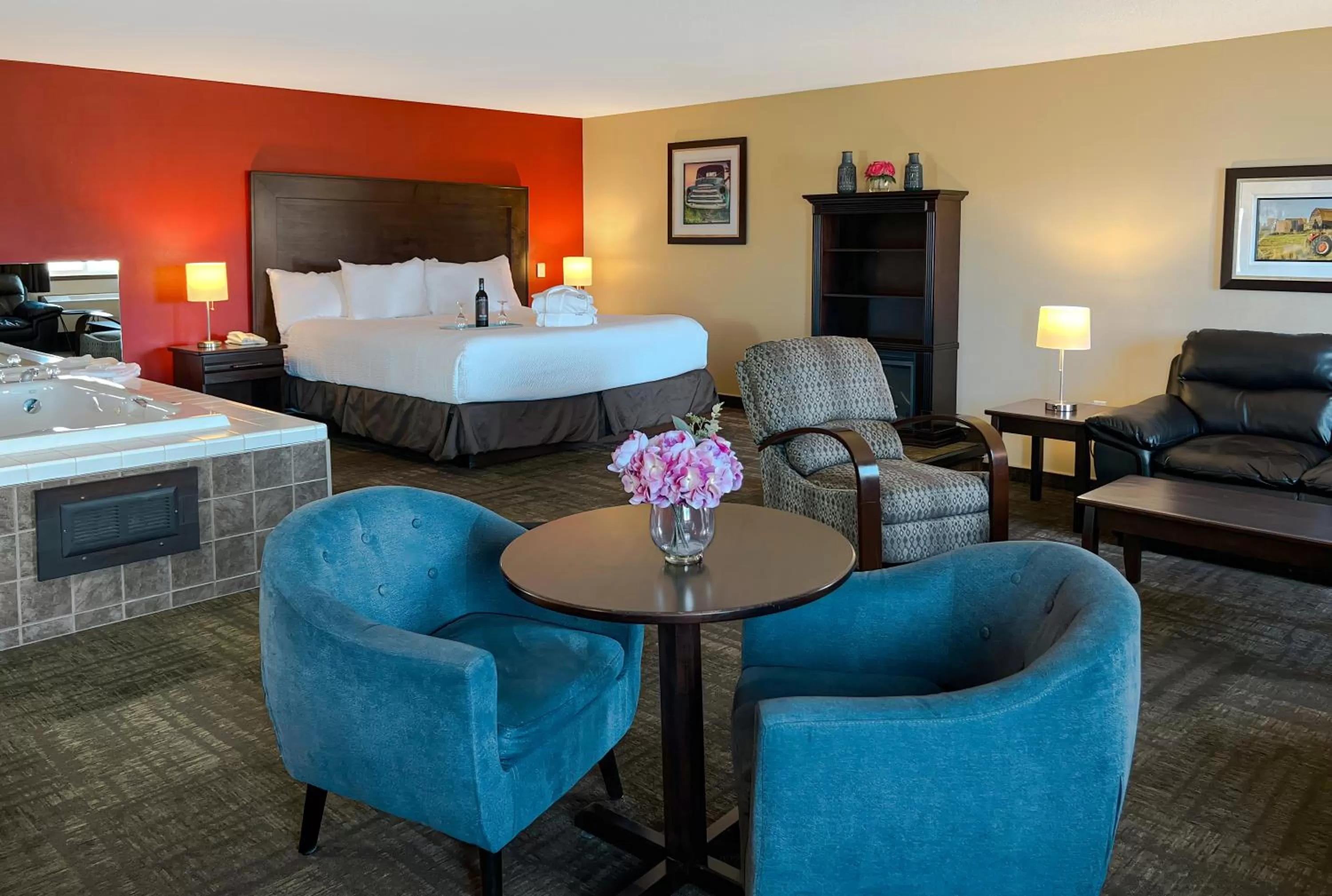 Seating area, Bed in Coast Swift Current Hotel