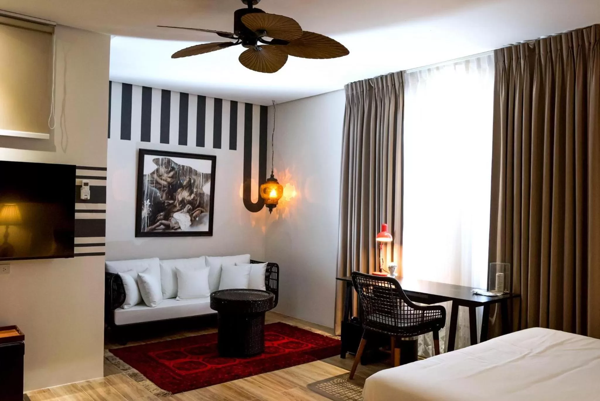 Living room, Bed in UNWND Boutique Hotel Dumaguete