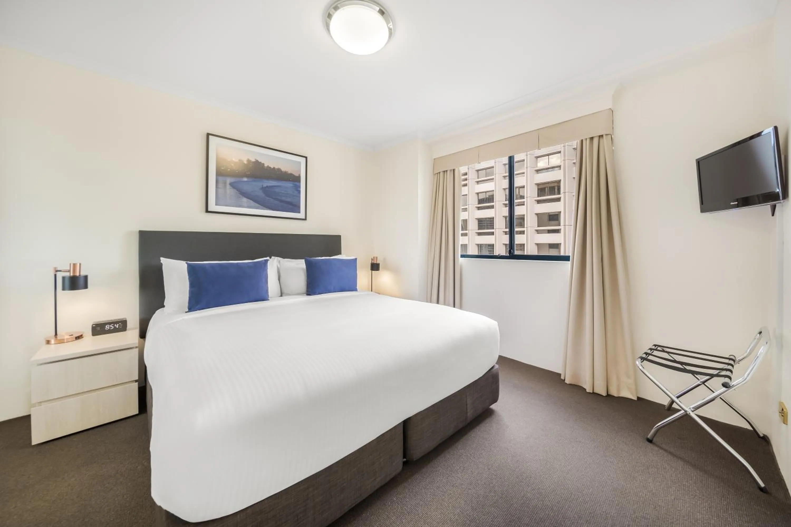Bed in Oaks Sydney Castlereagh Suites