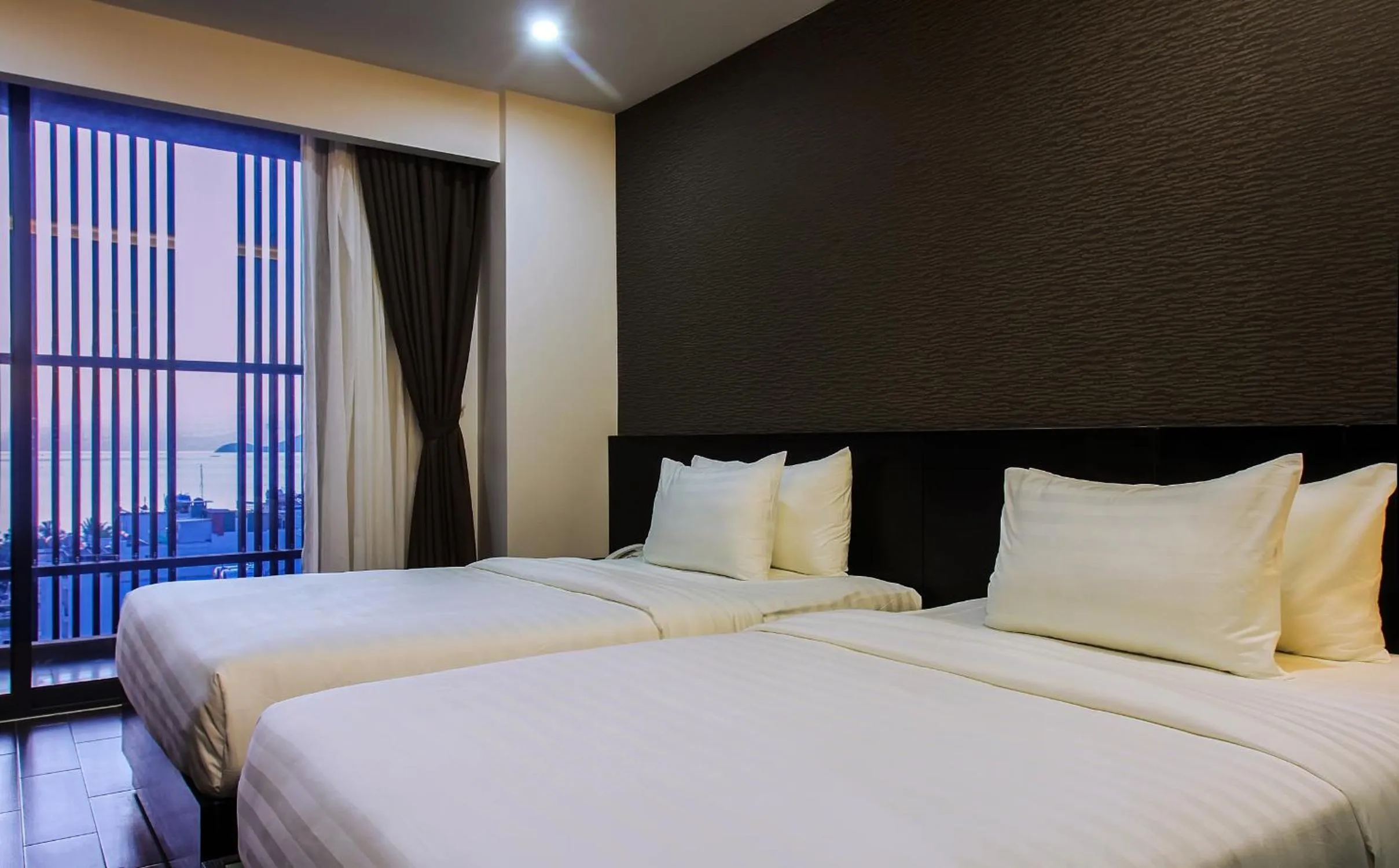 Bed in Golden Nha Trang Hotel