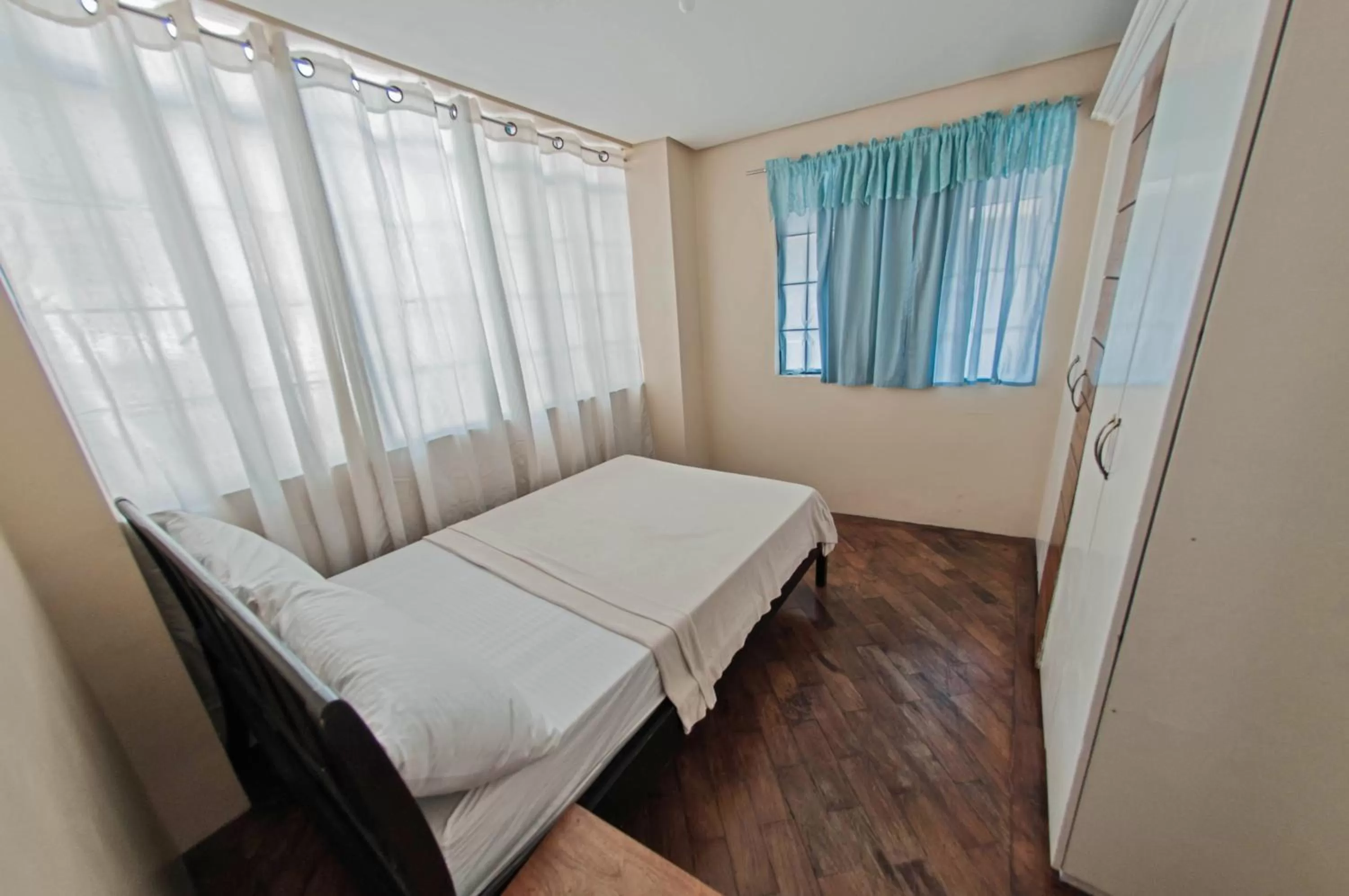 Bed in The Half House by Elmar Cabin