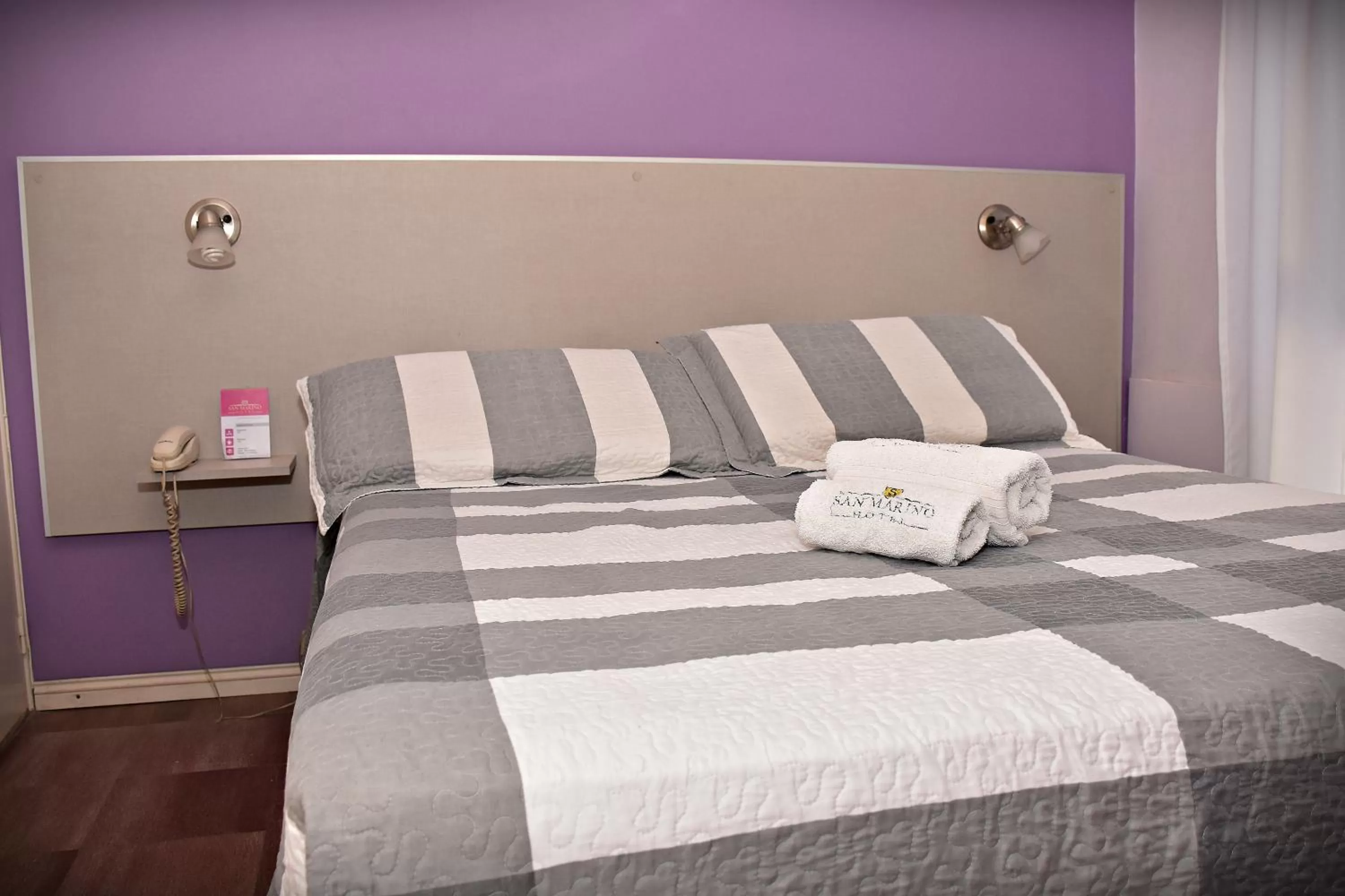 Bed in Hotel San Marino