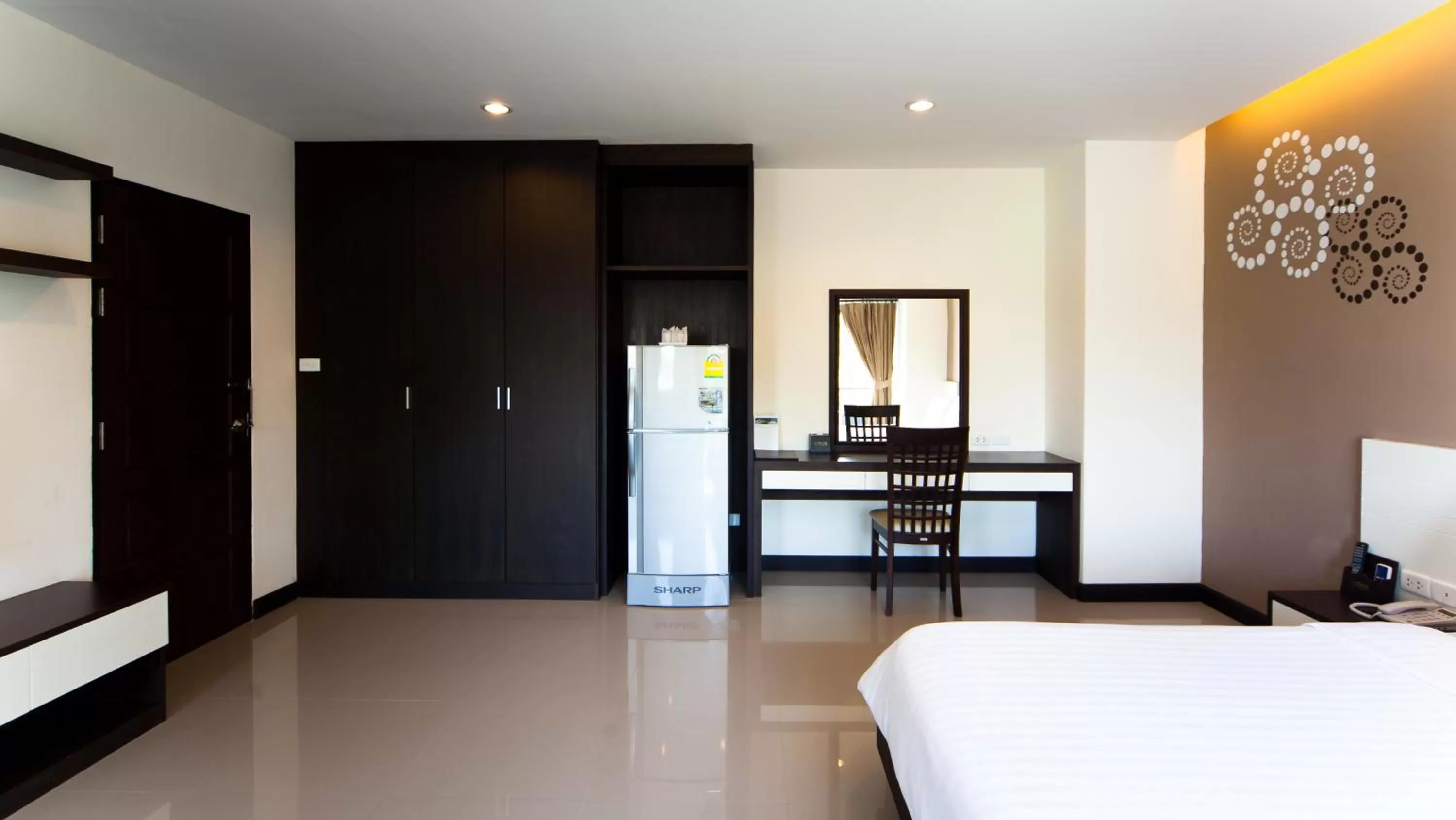 Photo of the whole room, Bed in Phavina Hotel Rayong SHA Extra Plus