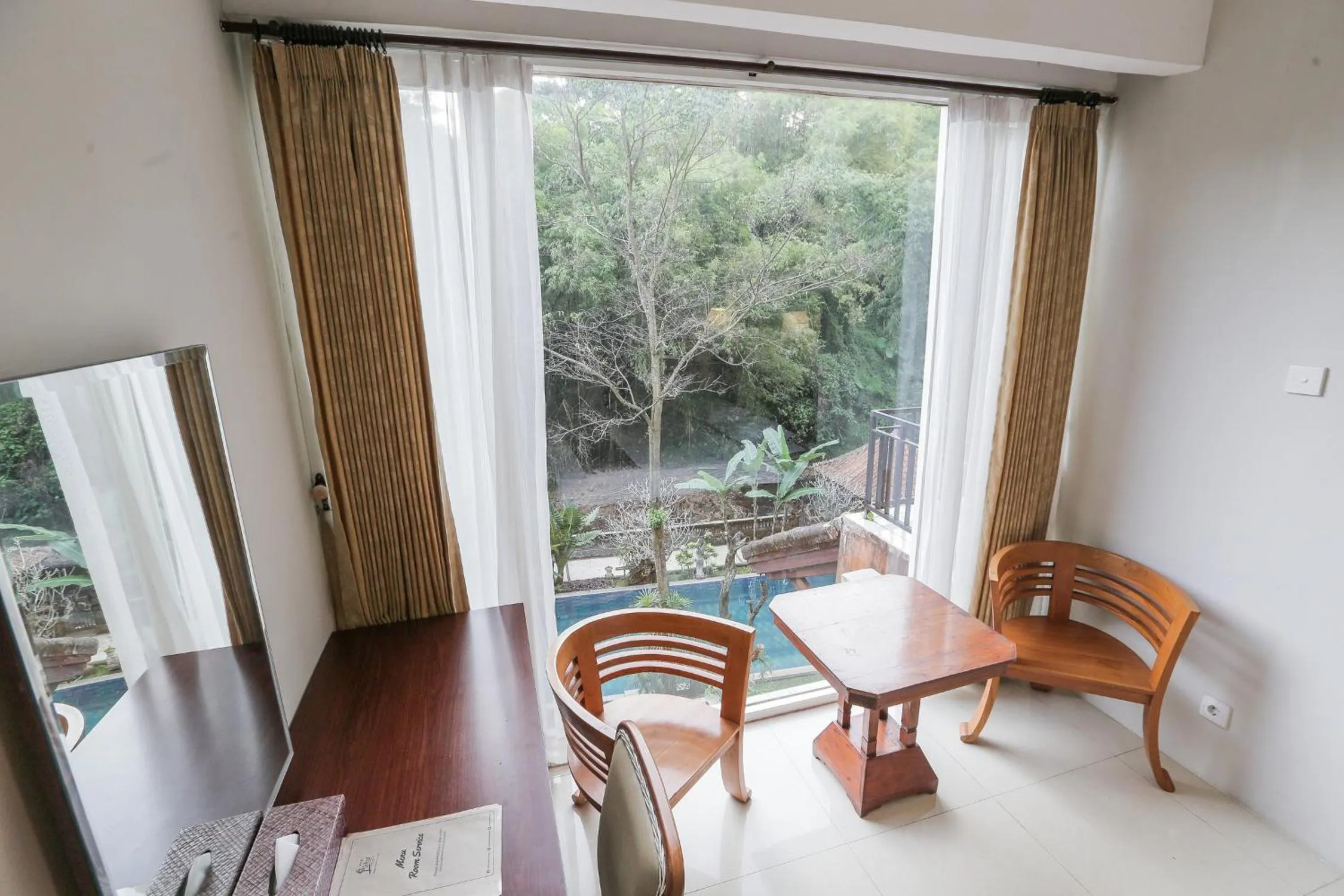 Bedroom in Ubud Hotel & Cottages