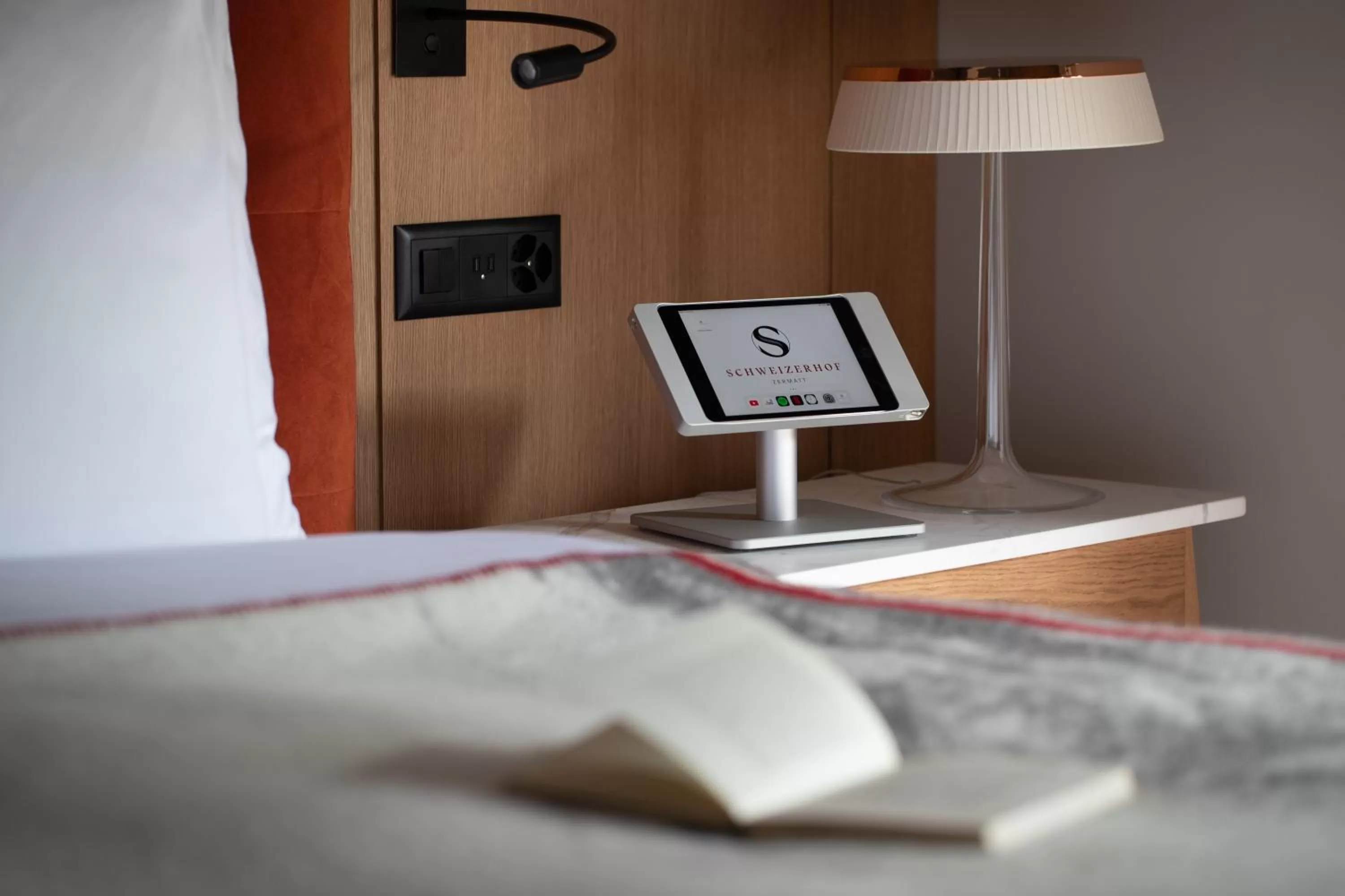 Decorative detail, Bed in Schweizerhof Zermatt - a Small Luxury Hotel